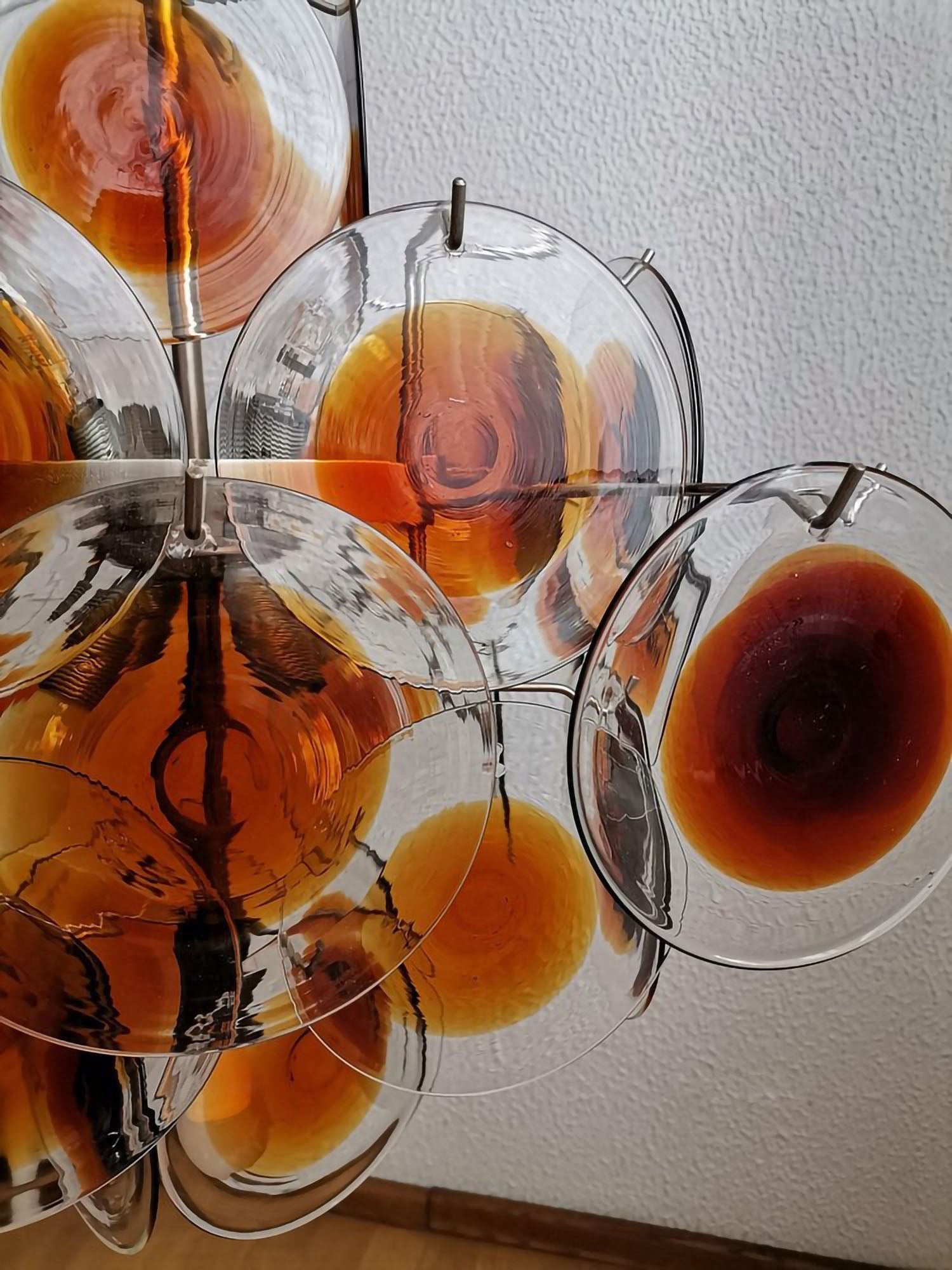 Side view of glass chandelier for scale and shape reference