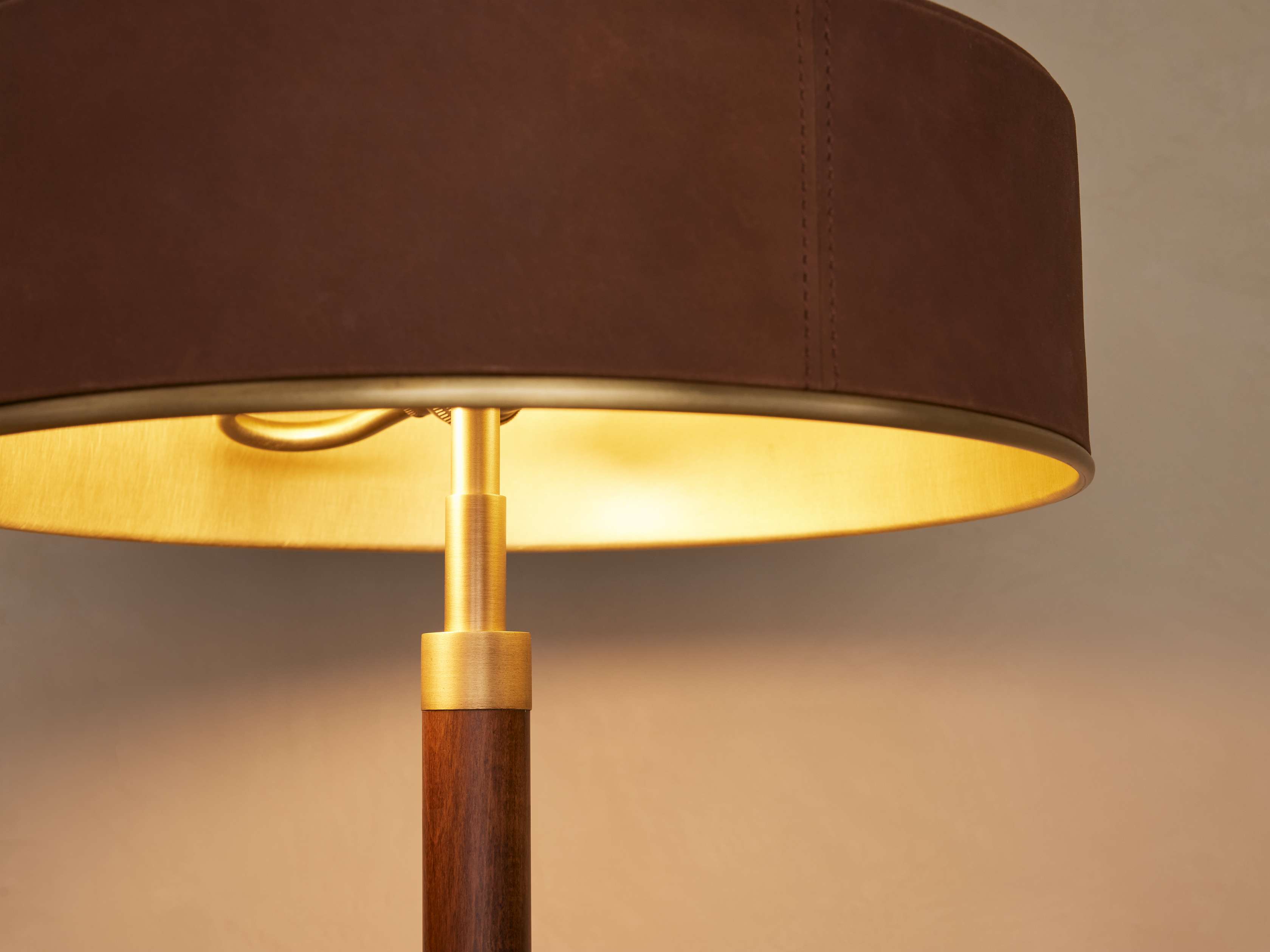 Side view of brass table lamp for scale and shape reference