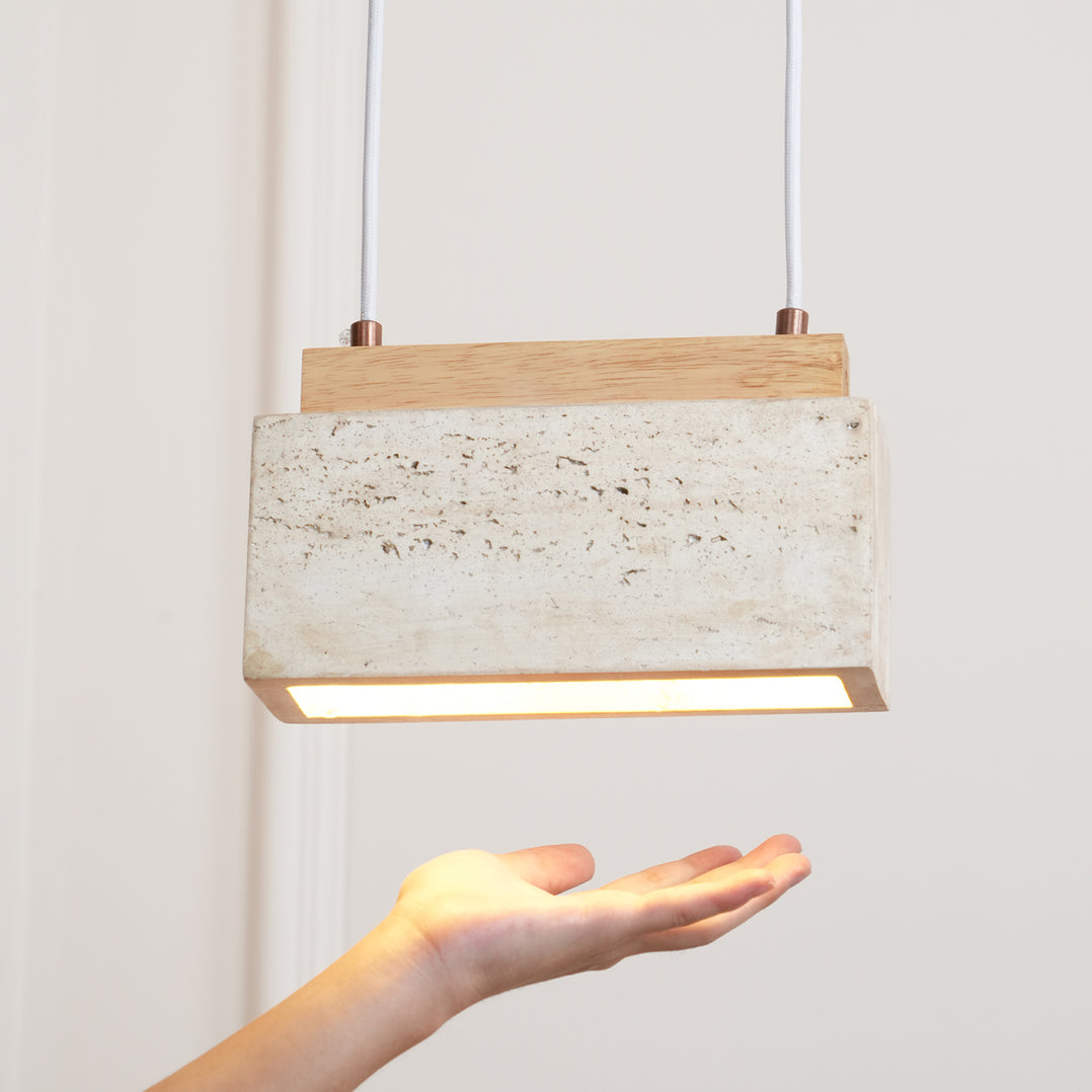 Side view of travertine pendant light for scale and shape reference