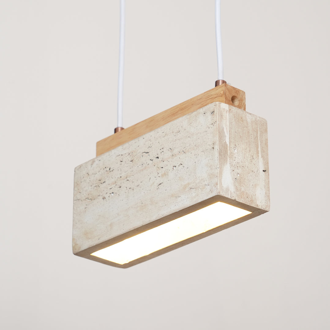 travertine pendant light shown as a main product image for kitchen islands