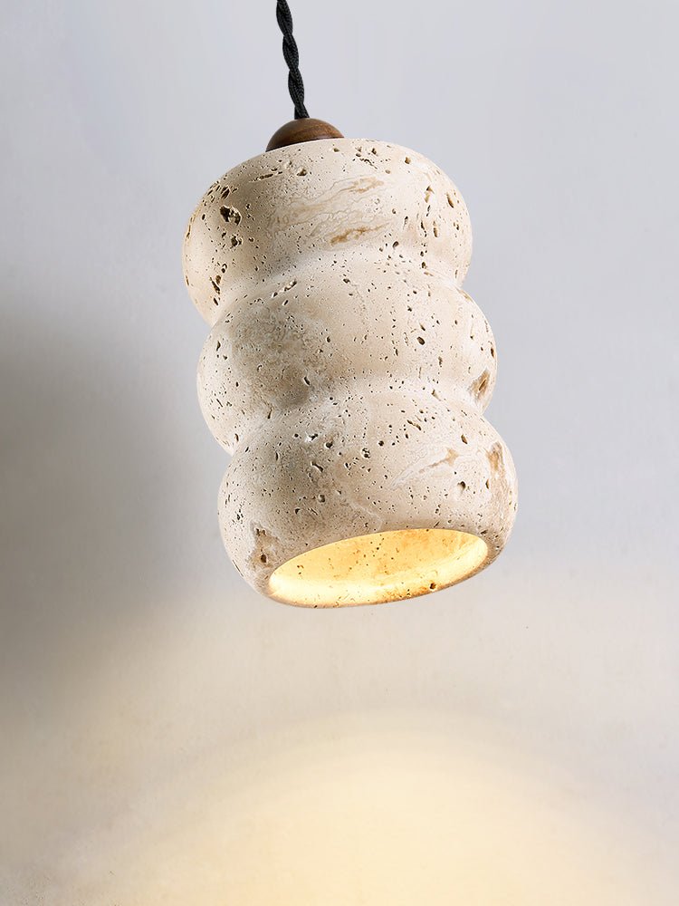 Side view of travertine pendant light for scale and shape reference