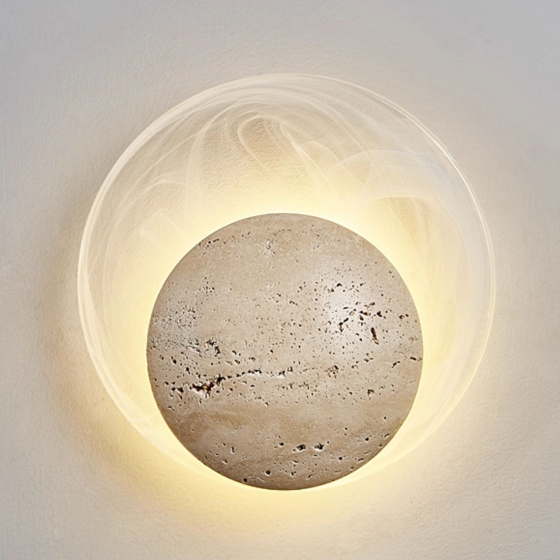 Side view of travertine lighting fixture for scale and shape reference