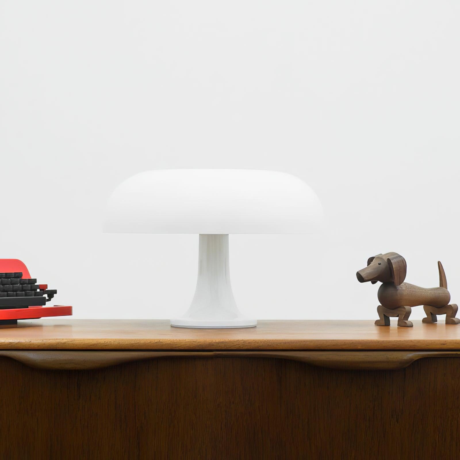 Side view of metal table lamp for scale and shape reference