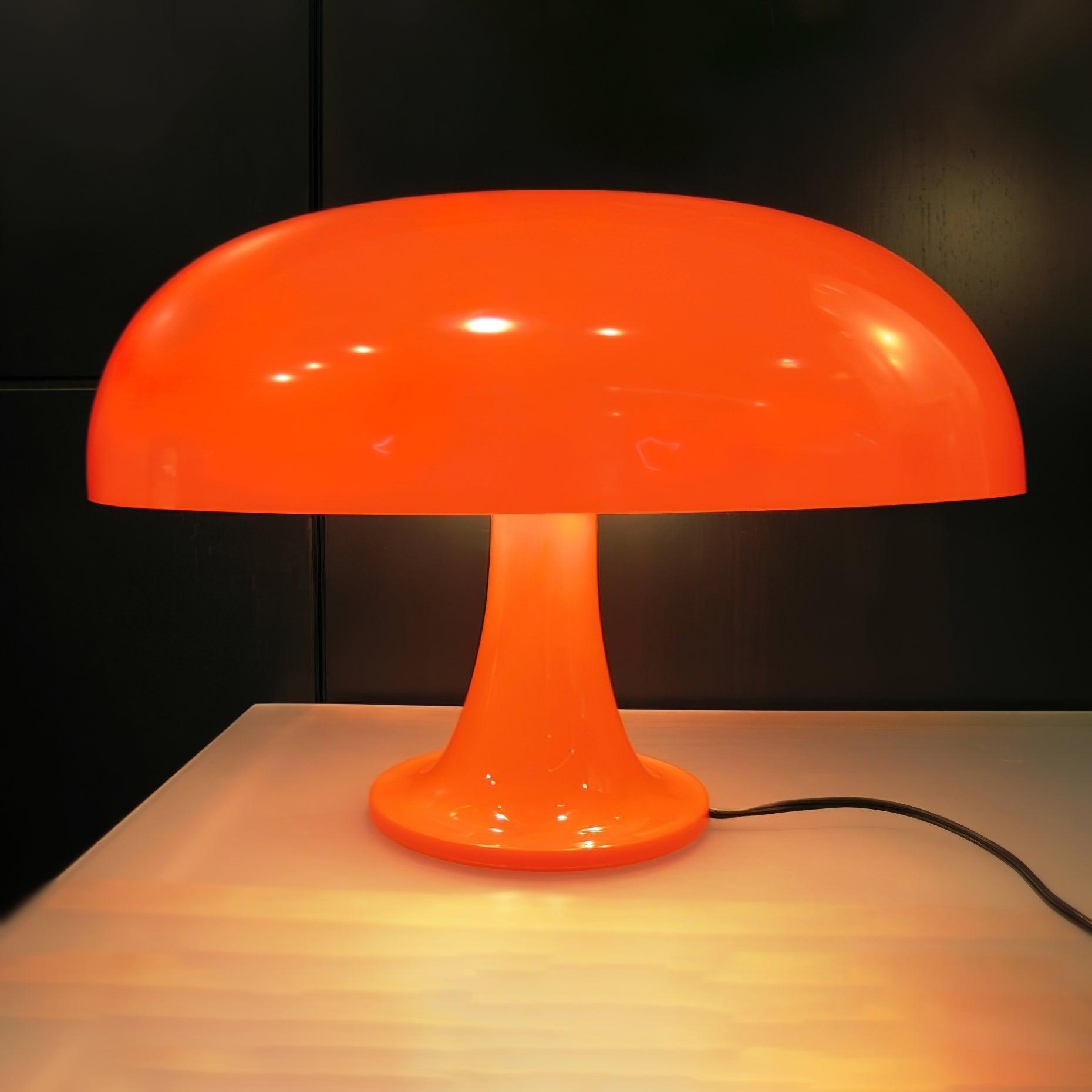 Side view of metal table lamp for scale and shape reference