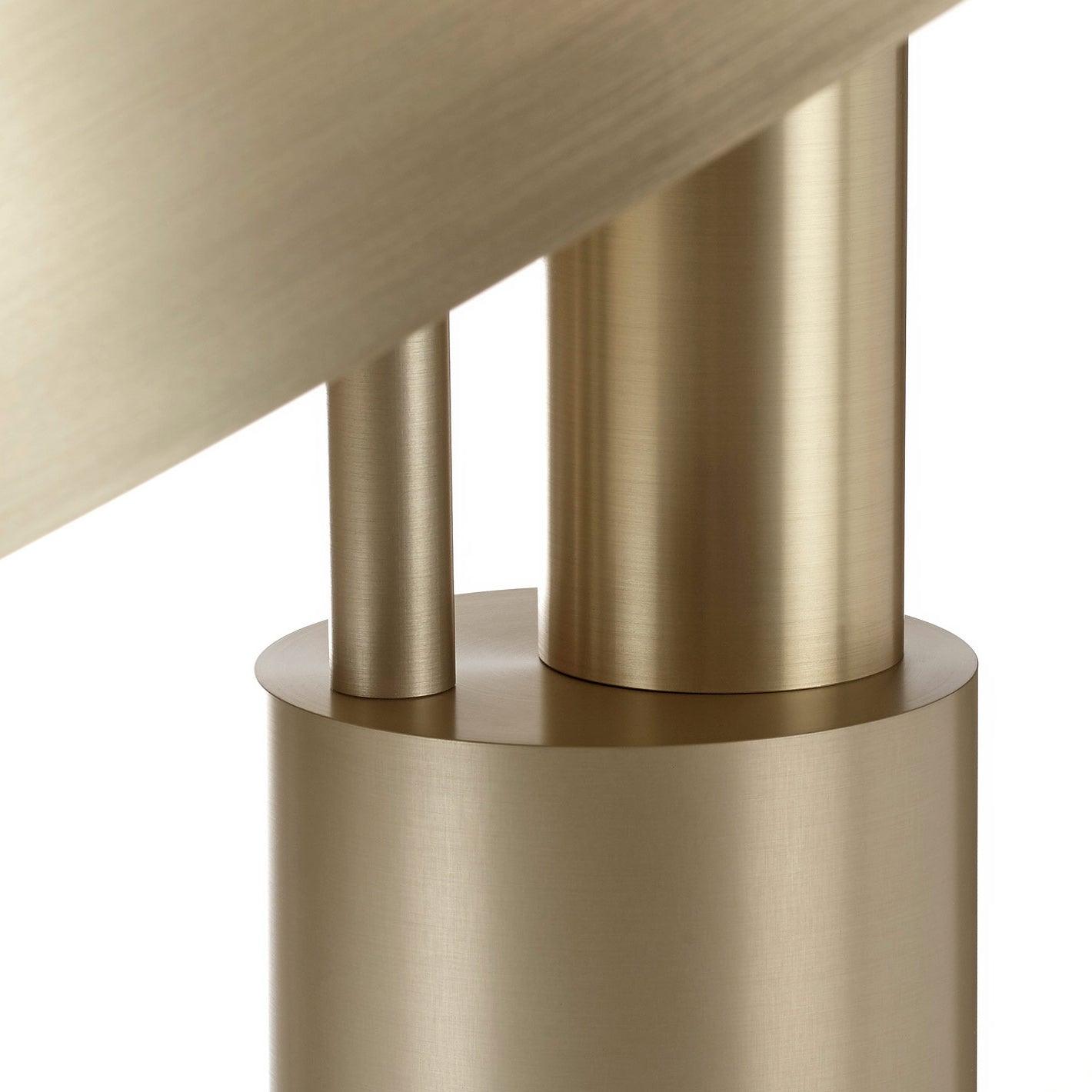Side view of metal table lamp for scale and shape reference