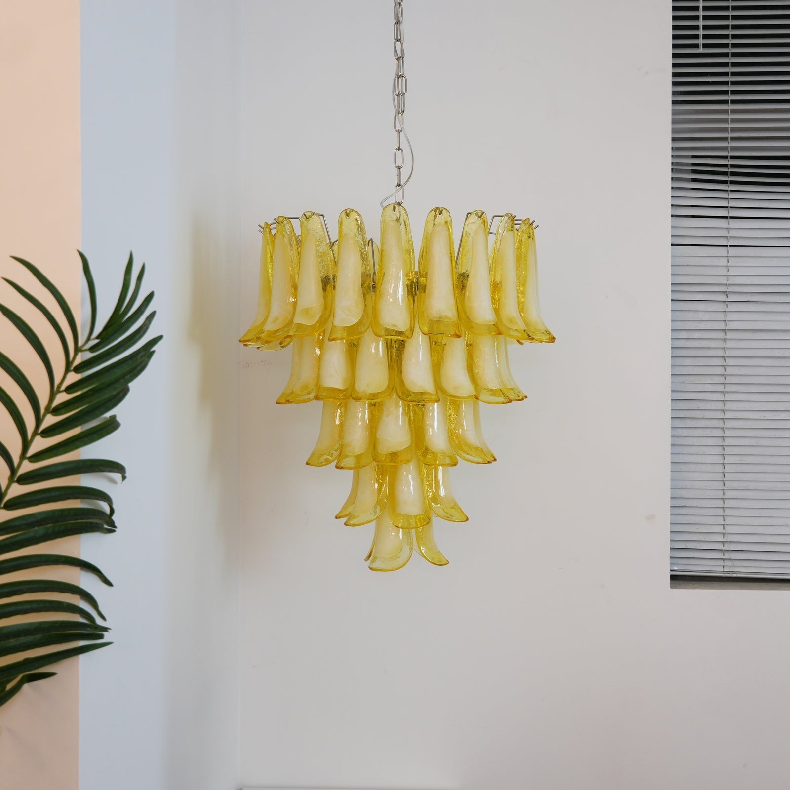 Side view of glass chandelier for scale and shape reference