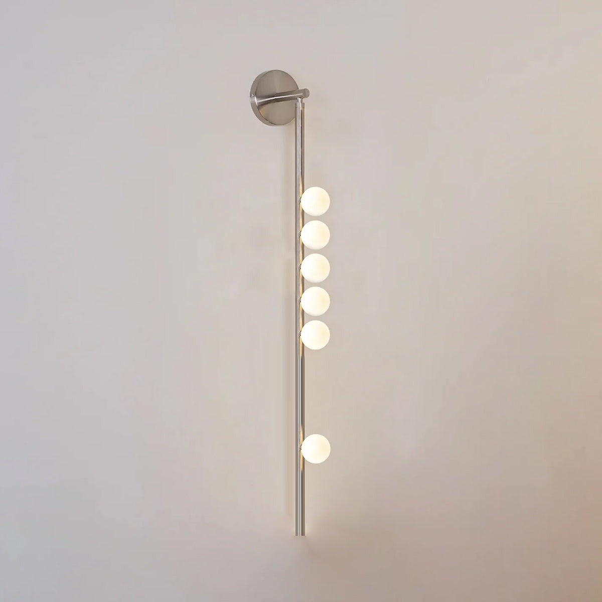 Close-up angle of Brass Halo Tube Wall Light Vanity Light showing form and material detail