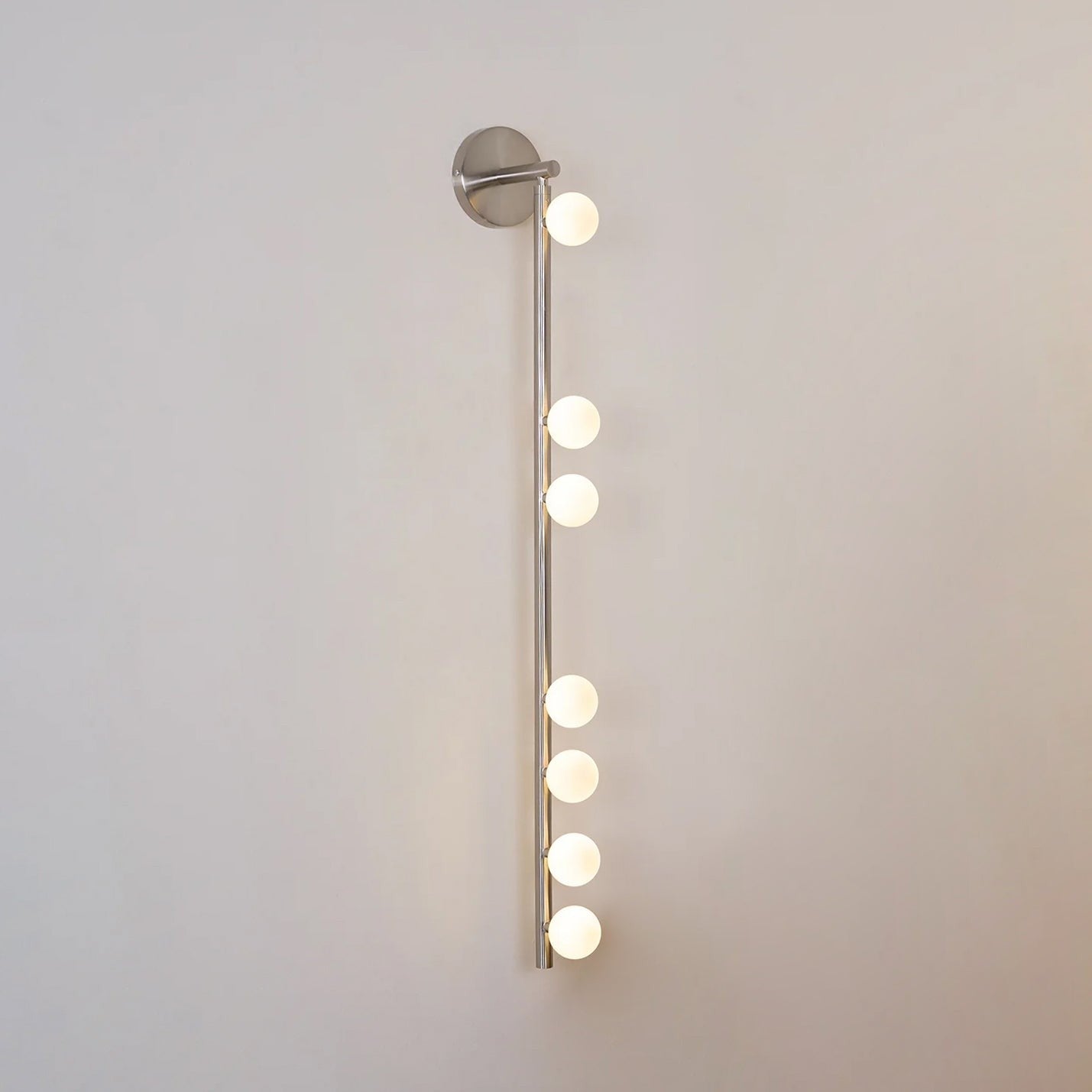 Close-up angle of Brass Halo Tube Wall Light Vanity Light showing form and material detail
