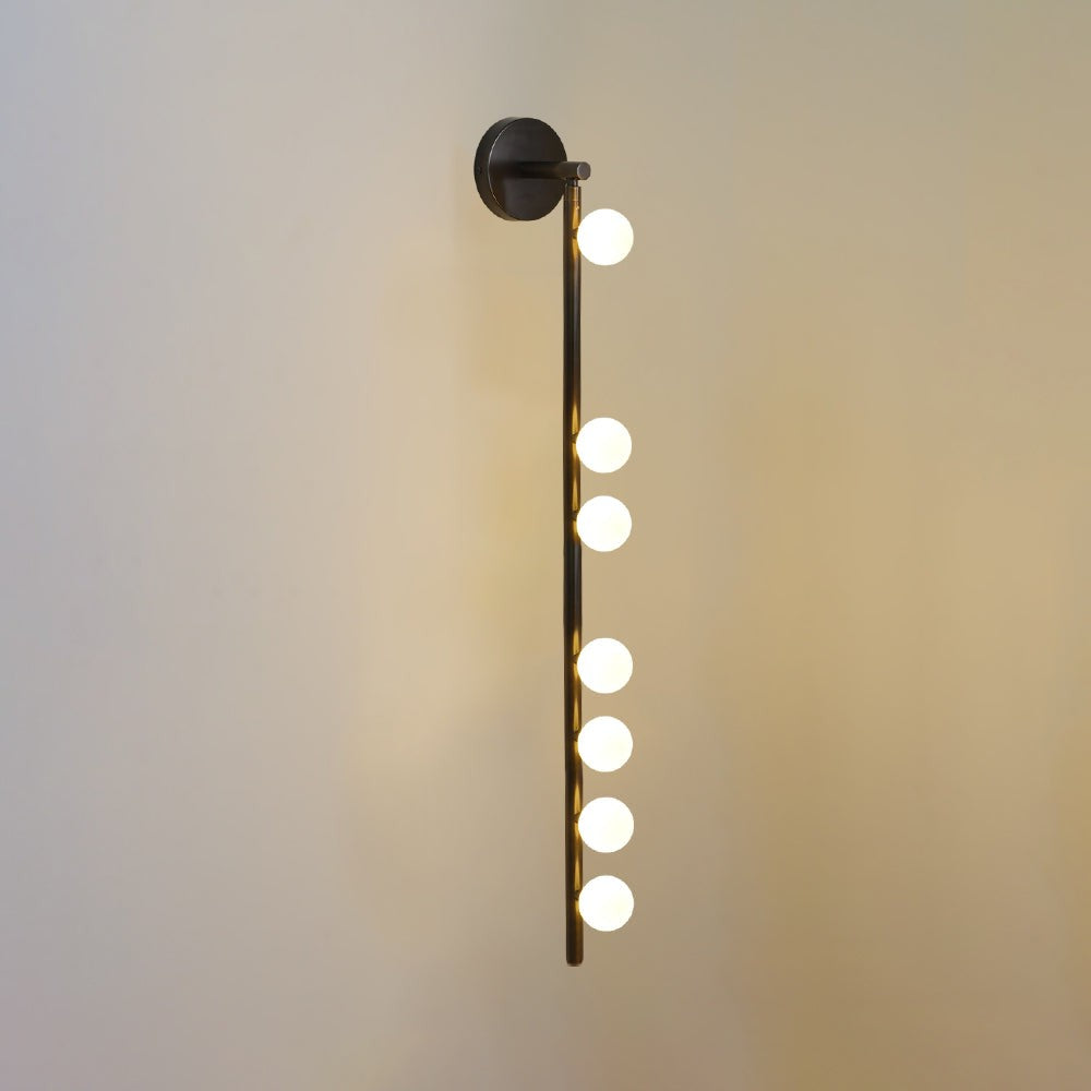 Side view of glass vanity light for scale and shape reference