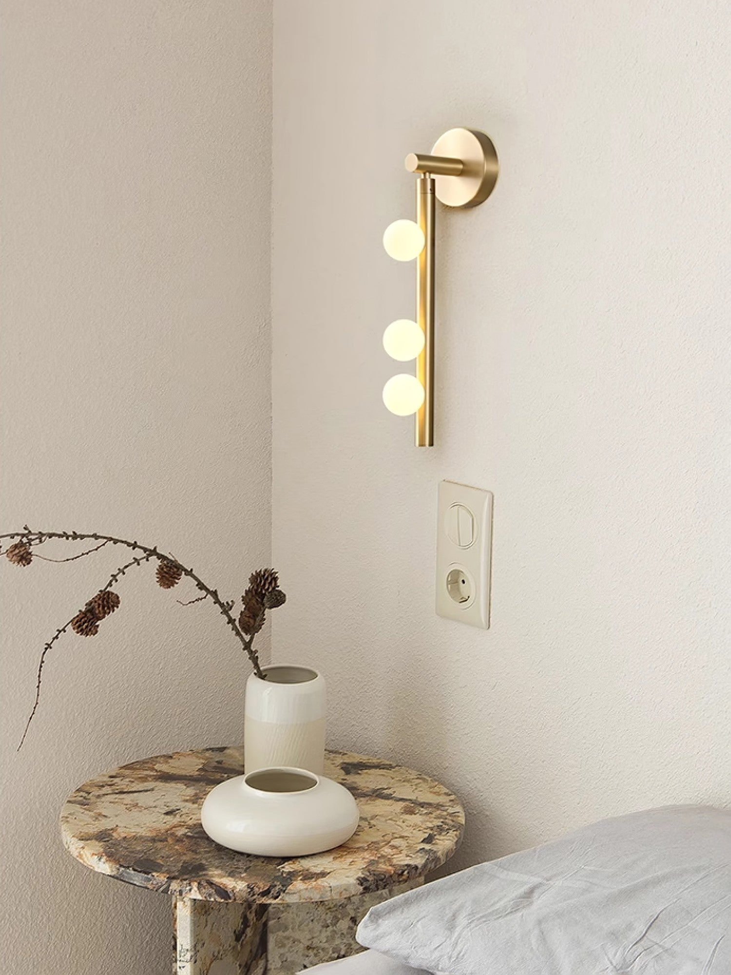 Side view of glass vanity light for scale and shape reference