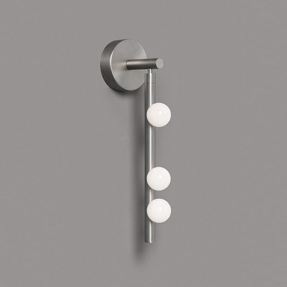 Close-up angle of Brass Halo Tube Wall Light Vanity Light showing form and material detail