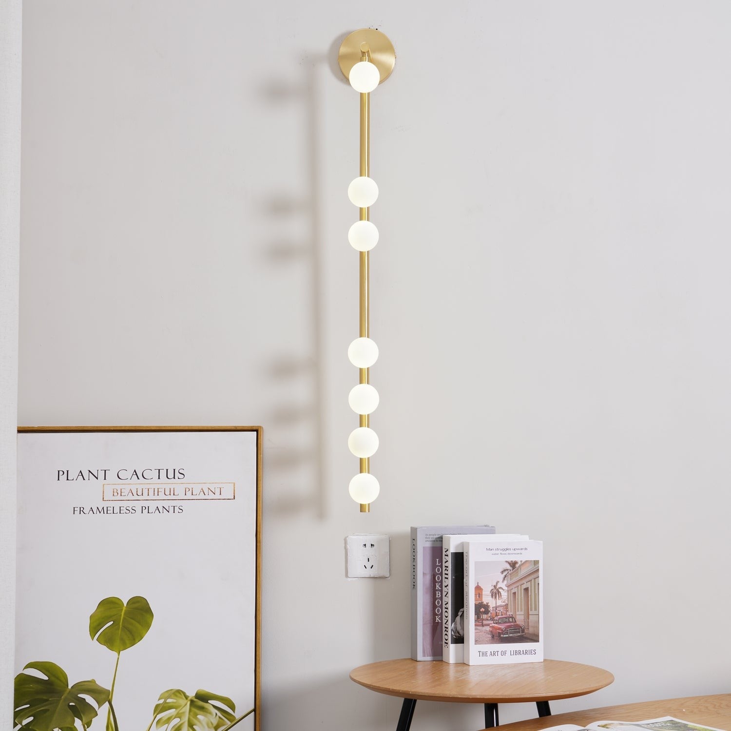 Close-up angle of Brass Halo Tube Wall Light Vanity Light showing form and material detail