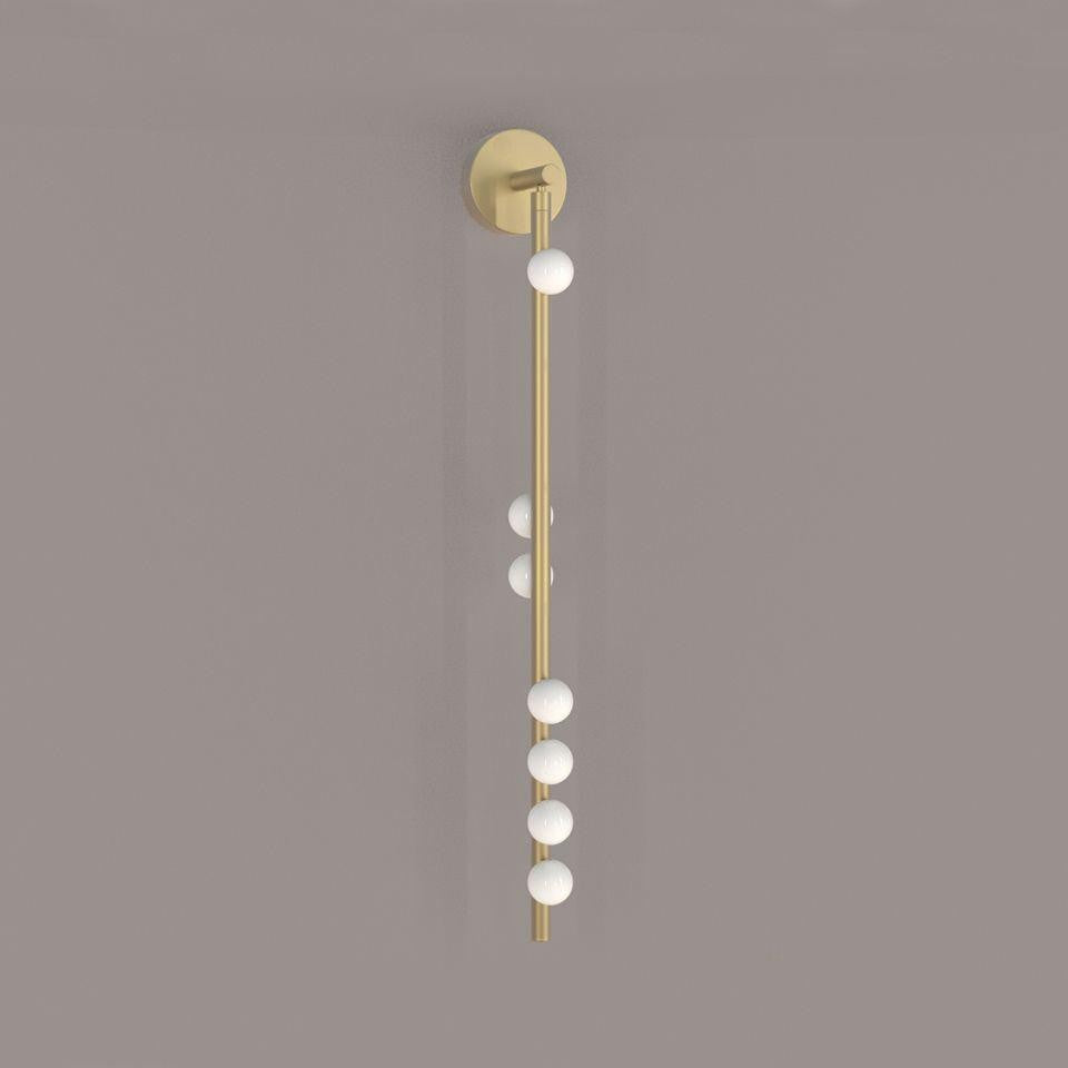 Close-up angle of Brass Halo Tube Wall Light Vanity Light showing form and material detail