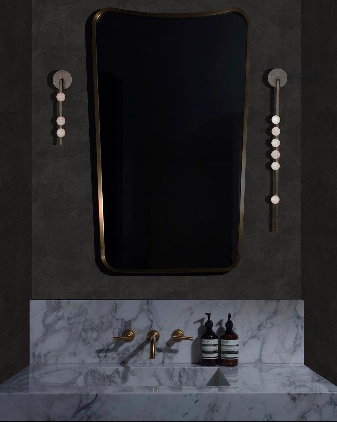 Close-up angle of Brass Halo Tube Wall Light Vanity Light showing form and material detail