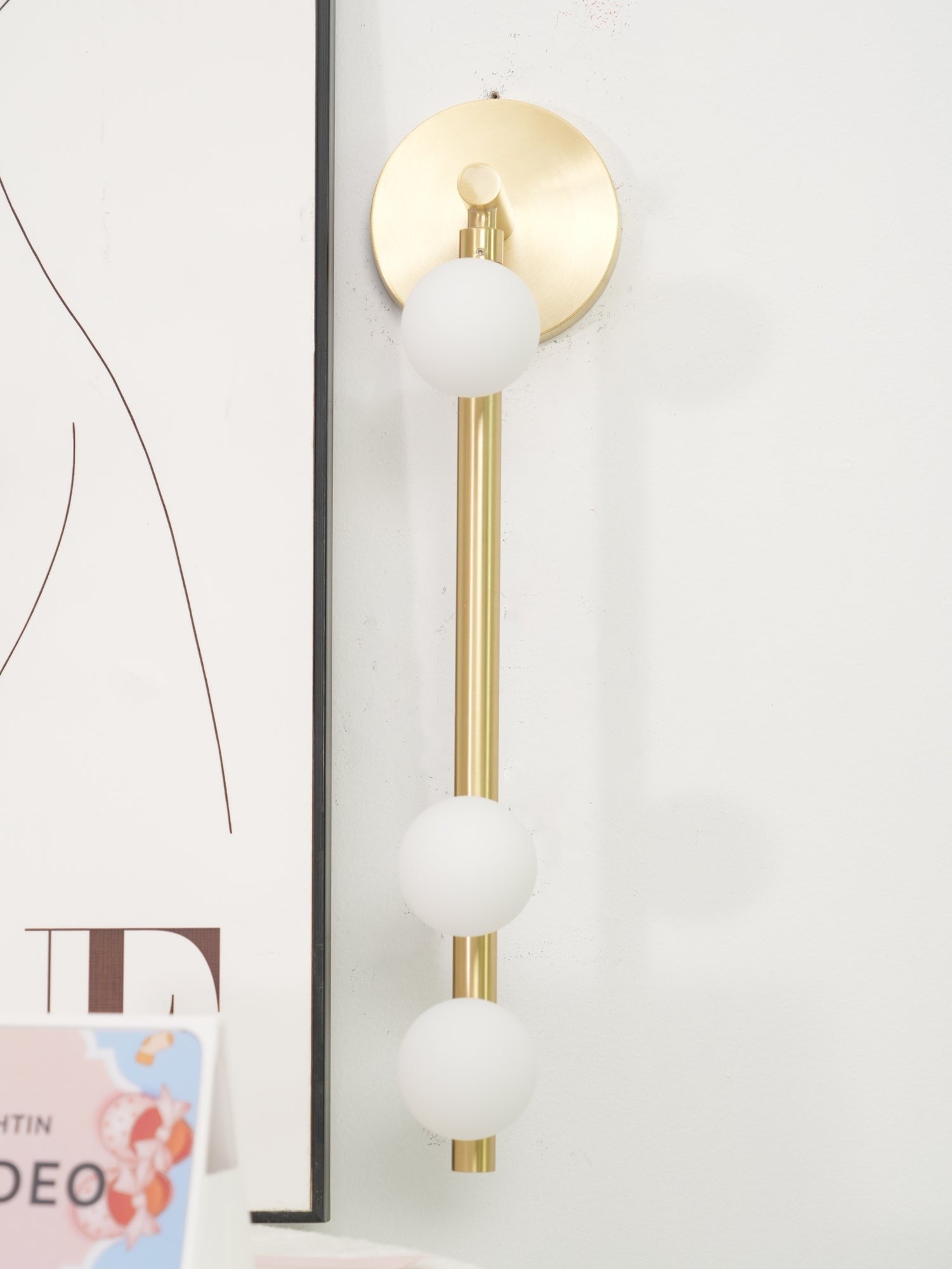 glass vanity light shown as a main product image for bathroom mirrors