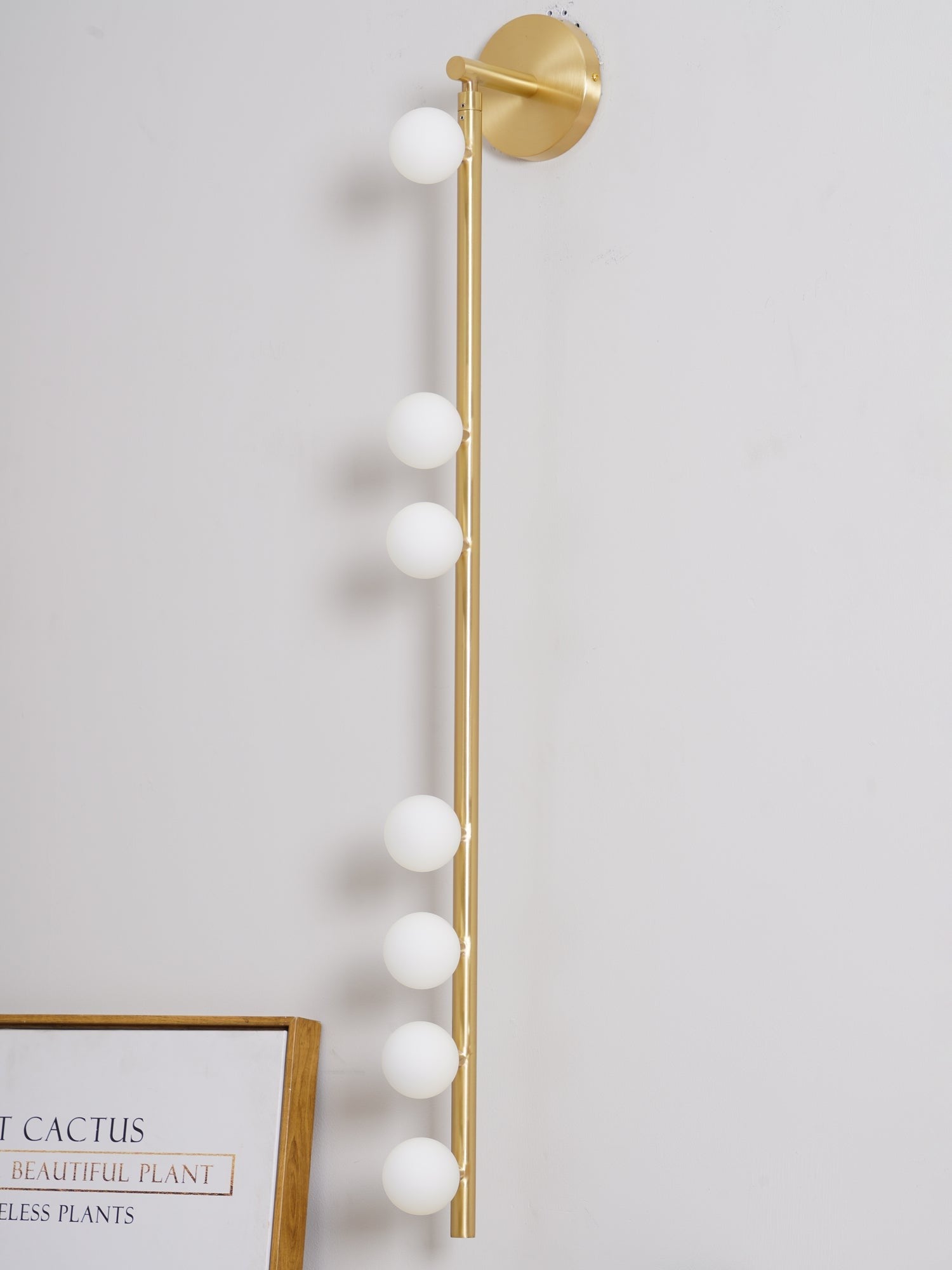 glass vanity light shown as a main product image for bathroom mirrors