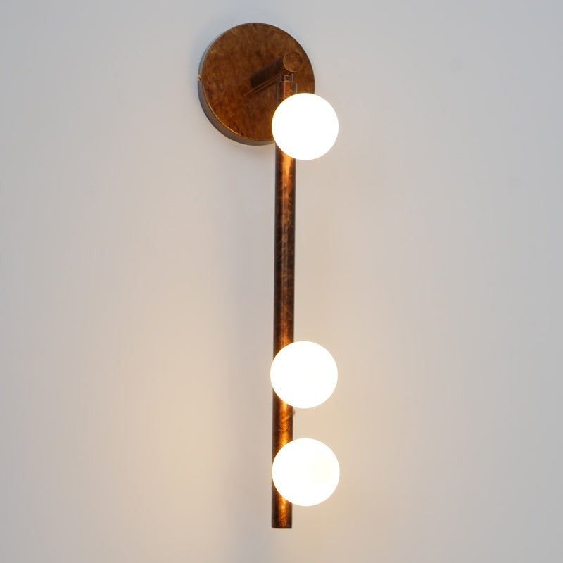 Side view of glass vanity light for scale and shape reference