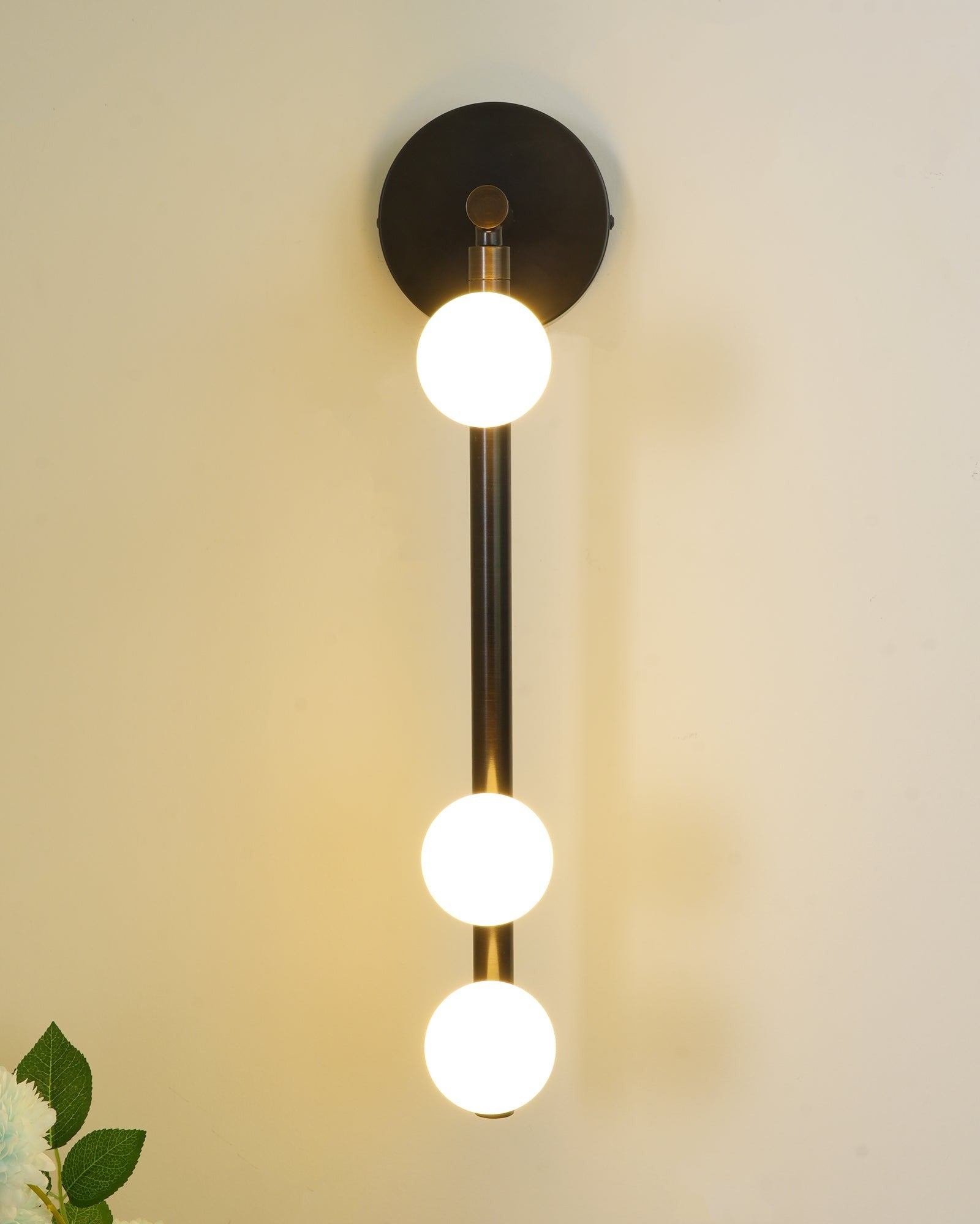 Side view of glass vanity light for scale and shape reference