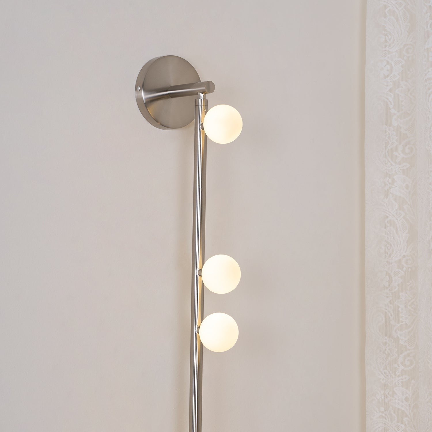 Close-up angle of Brass Halo Tube Wall Light Vanity Light showing form and material detail