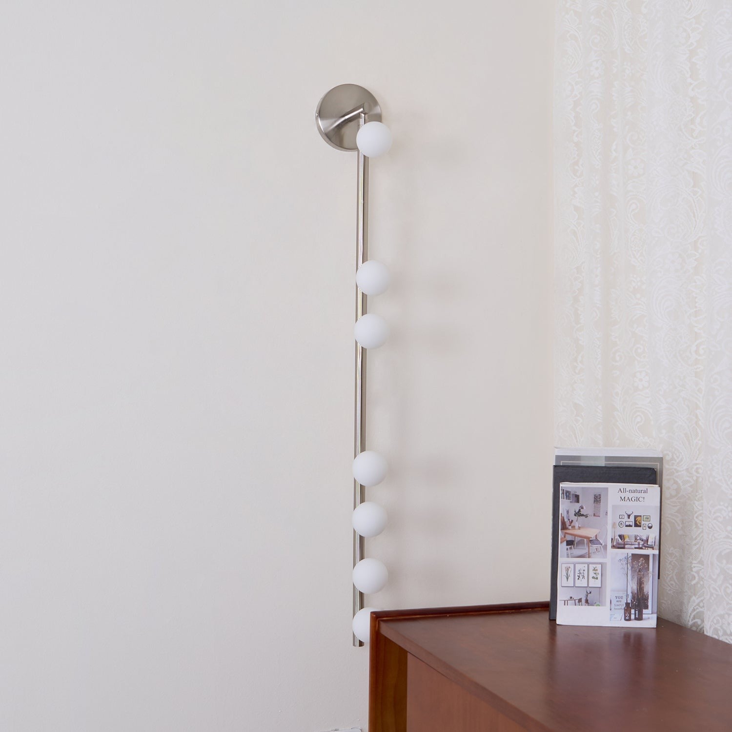 glass vanity light shown as a main product image for bathroom mirrors