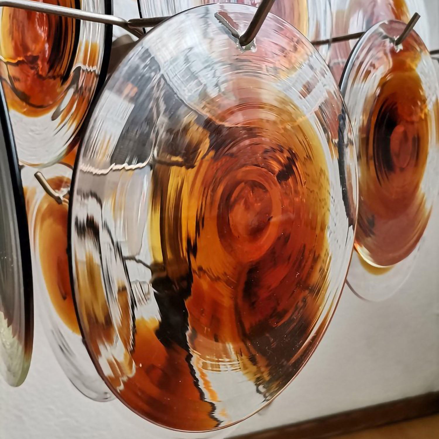 Side view of glass chandelier for scale and shape reference