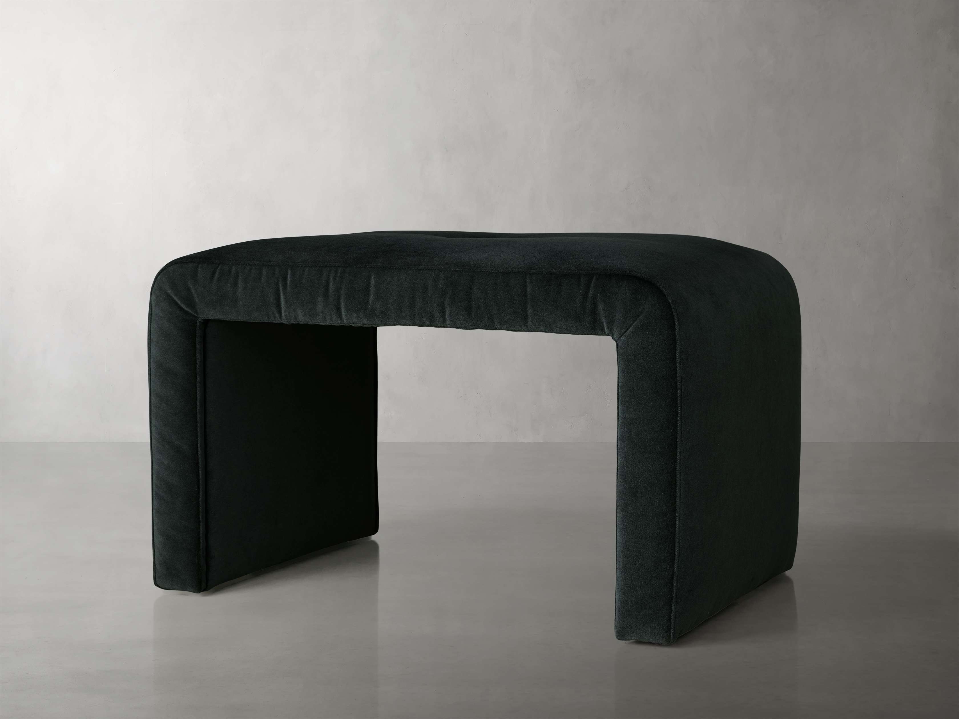 Close-up angle of Ryan Ottoman in Banks Midnight Home Accent showing form and material detail