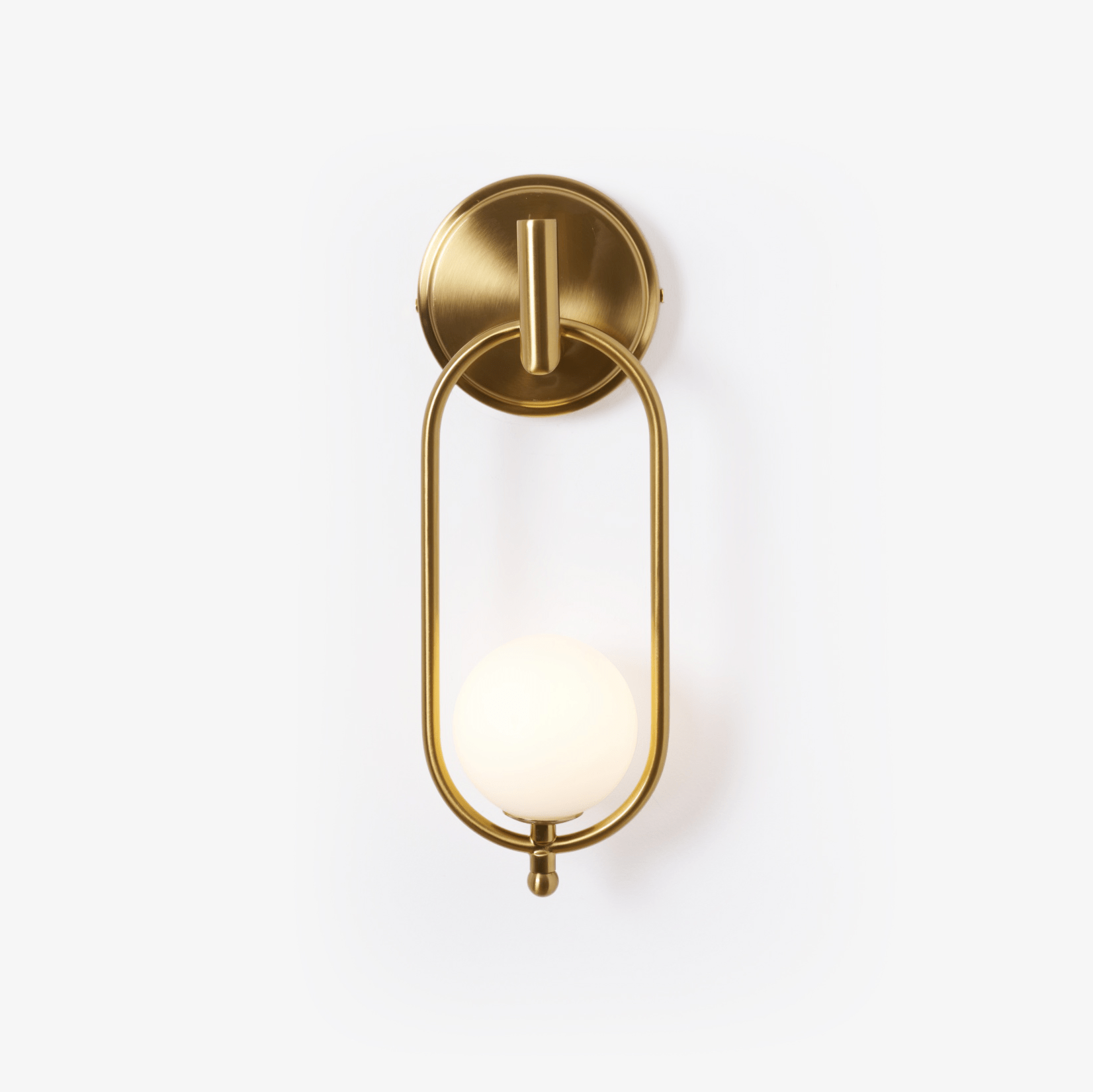 Aurea brass wall light with slim hardwired profile