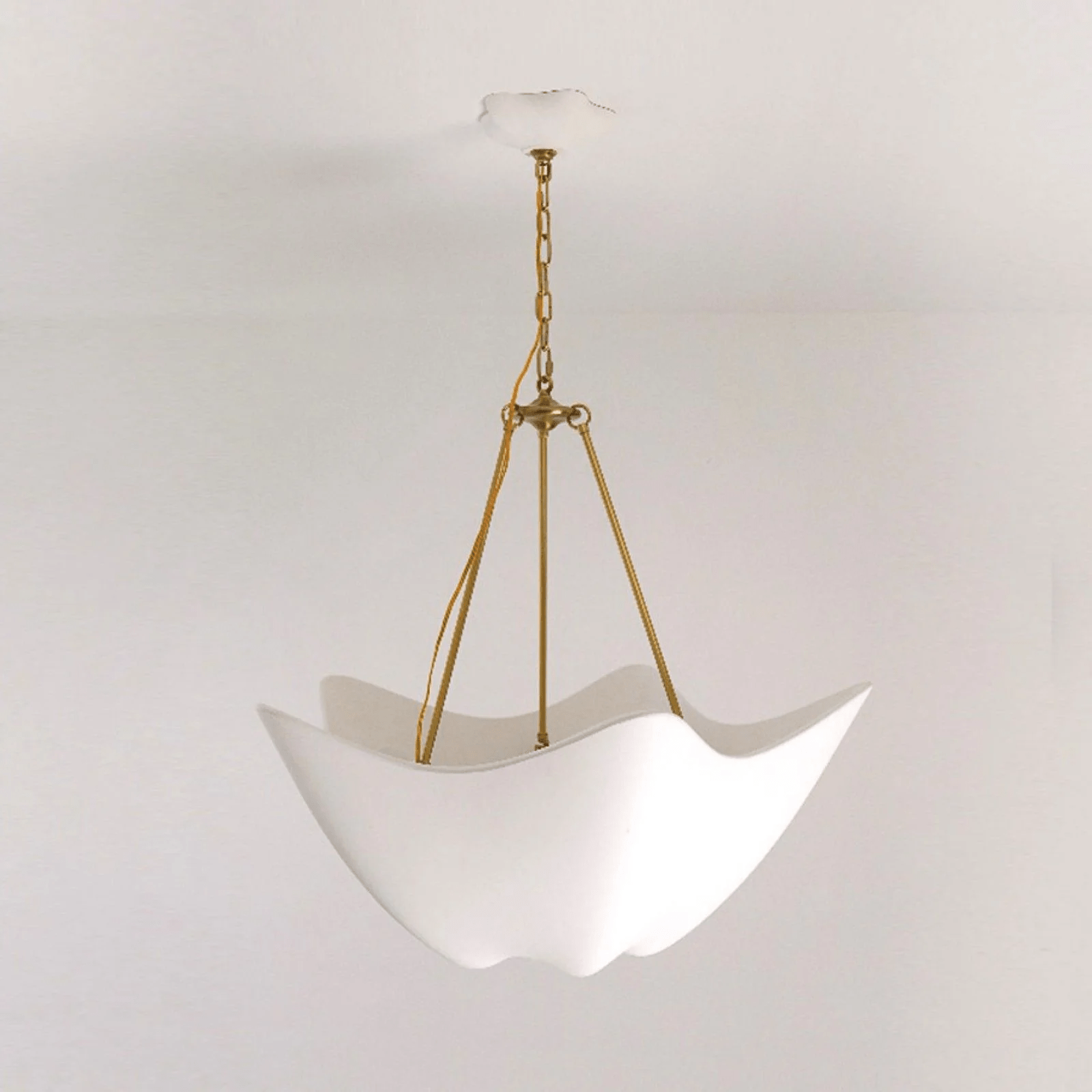 Side view of metal chandelier for scale and shape reference