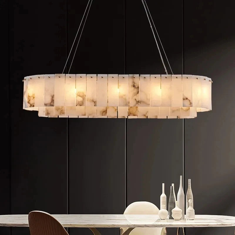 Linear marble chandelier shown at dining-room scale