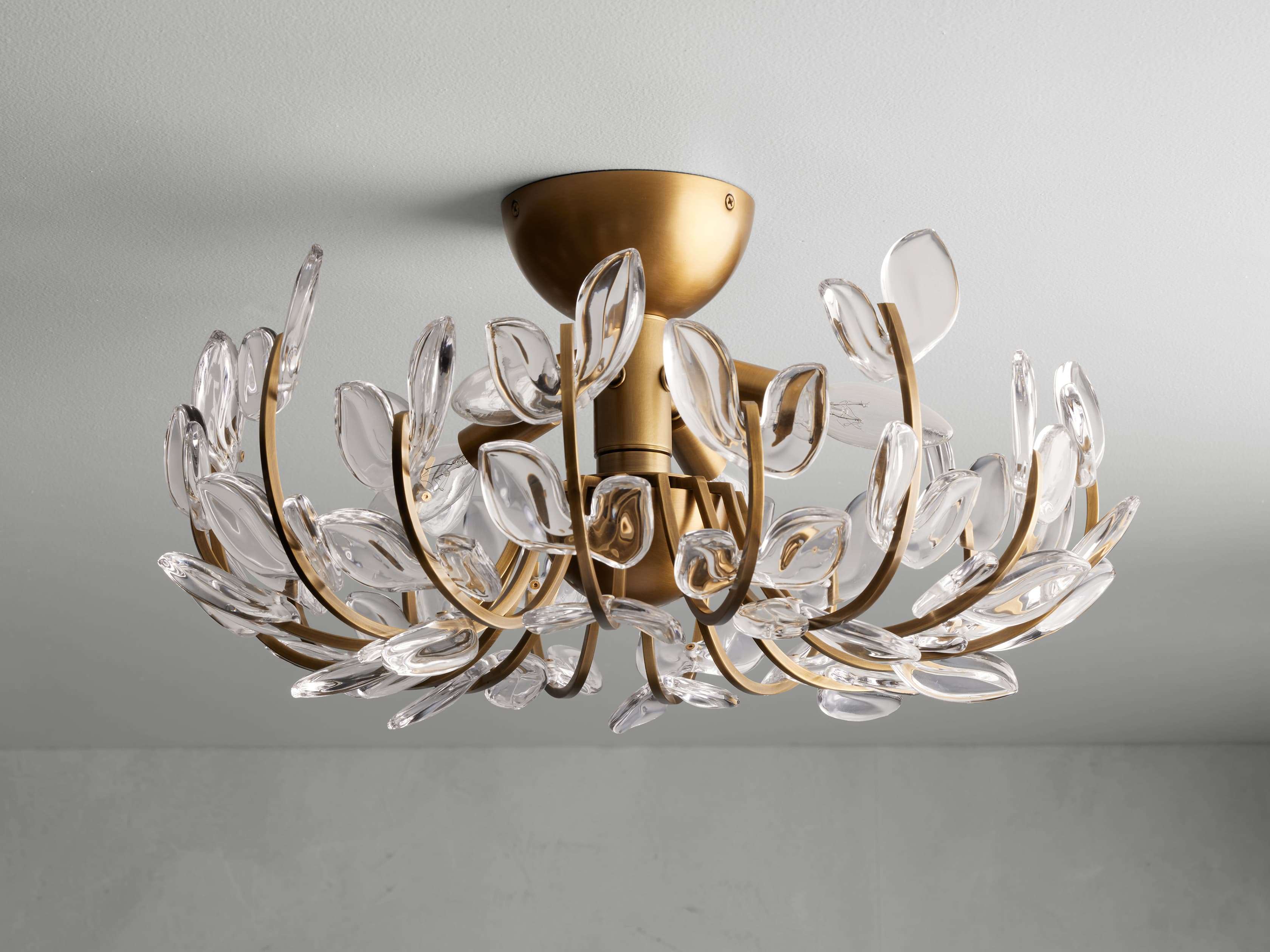 Side view of glass ceiling light for scale and shape reference