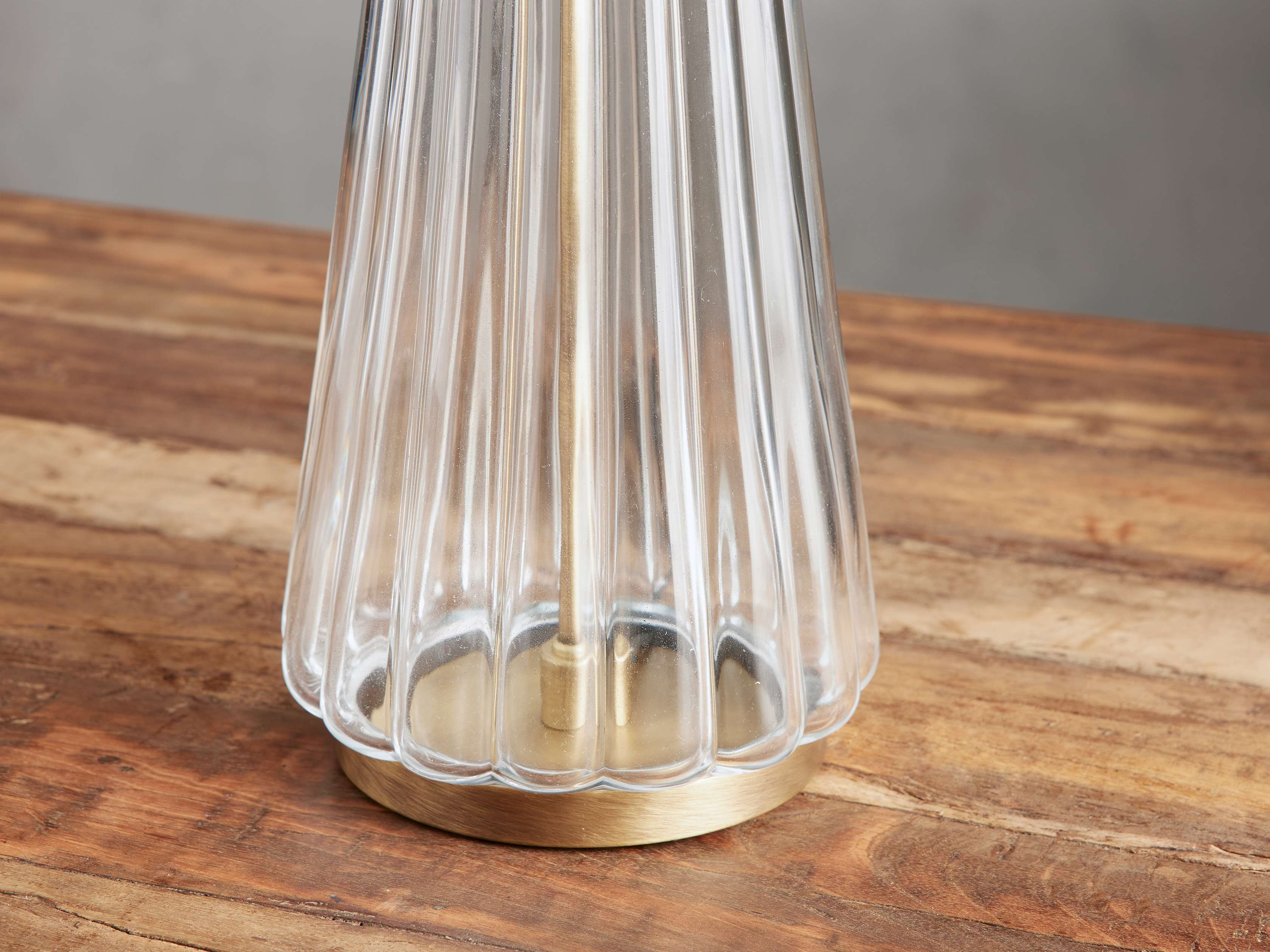 Side view of glass table lamp for scale and shape reference