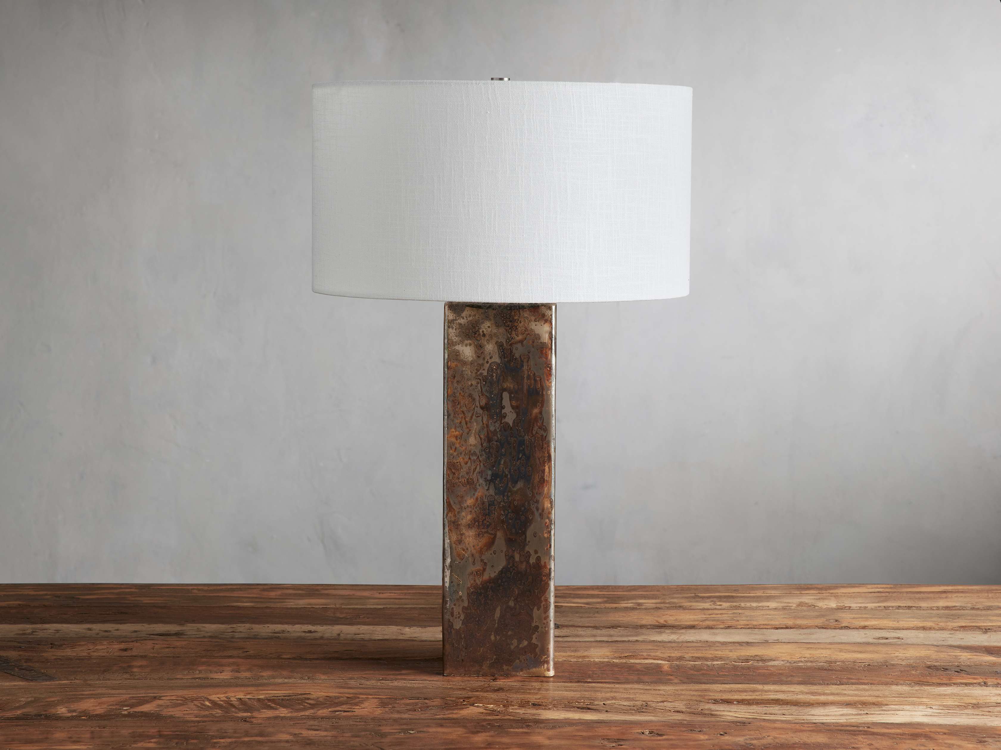 Close-up angle of Adrano Table Lamp in Copper with Natural Shade showing form and material detail