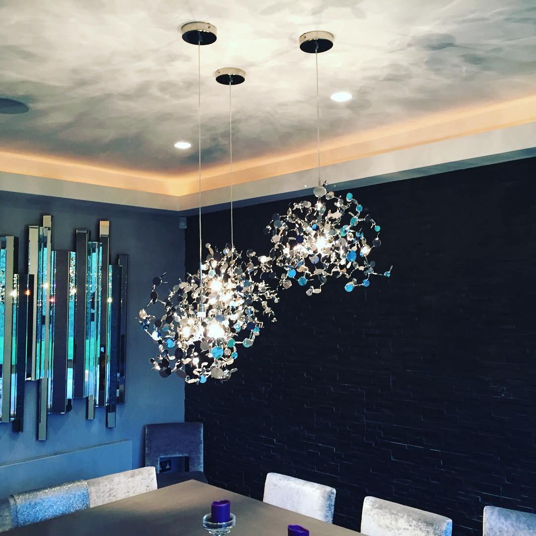 Side view of nickel chandelier for scale and shape reference