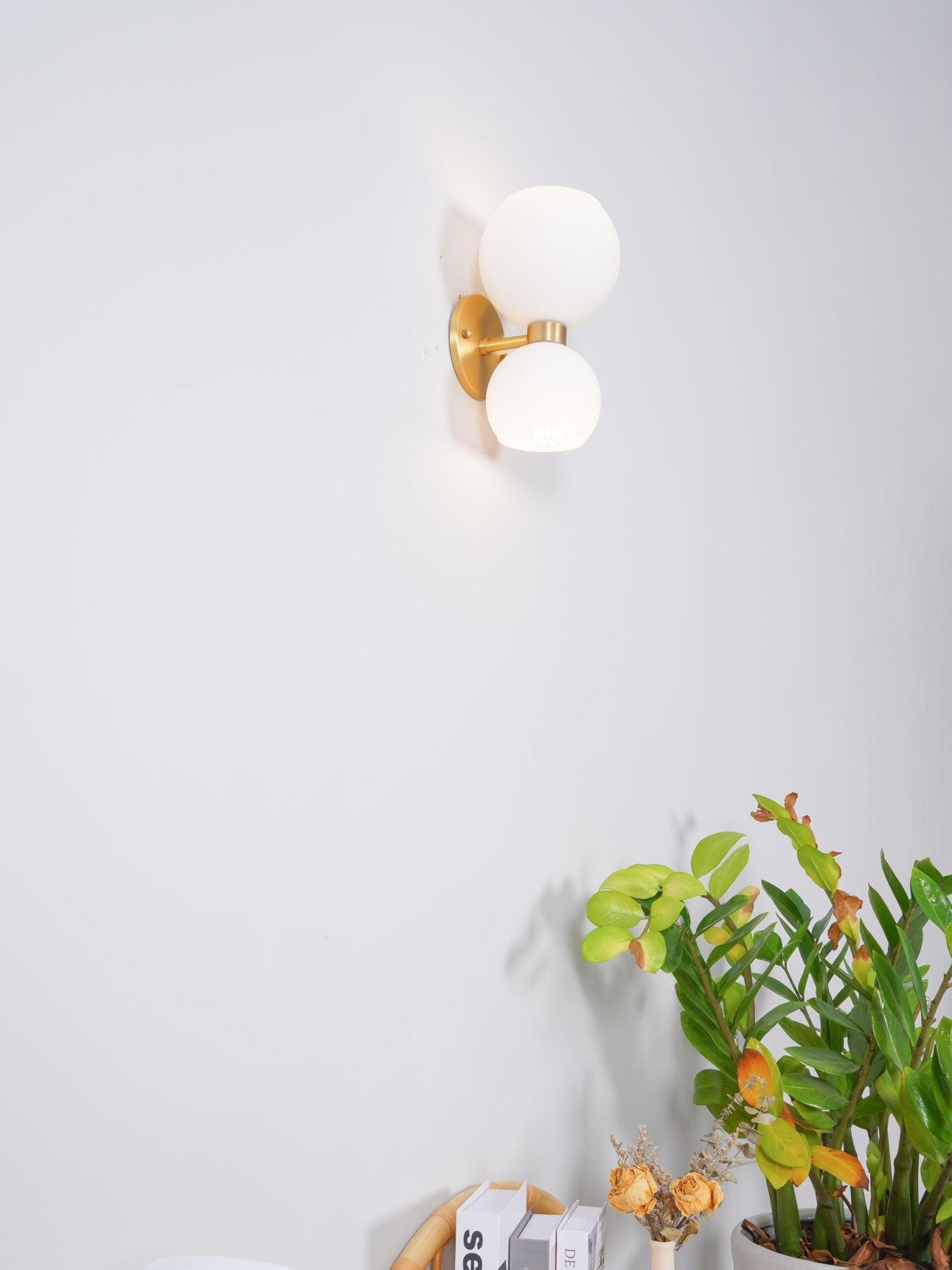 Side view of glass lighting fixture for scale and shape reference