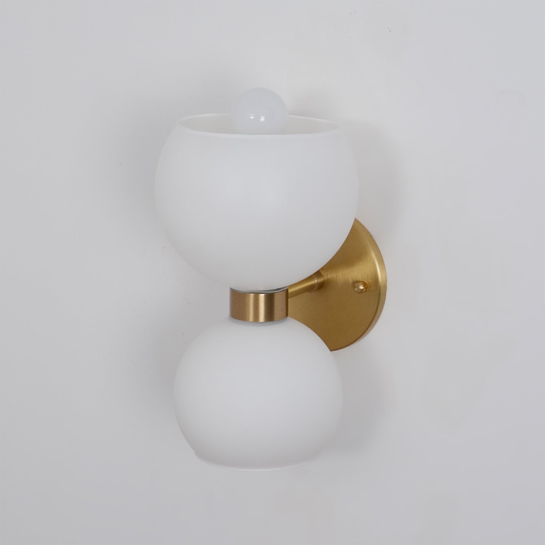 Close-up angle of Betty Wall Lamp showing form and material detail