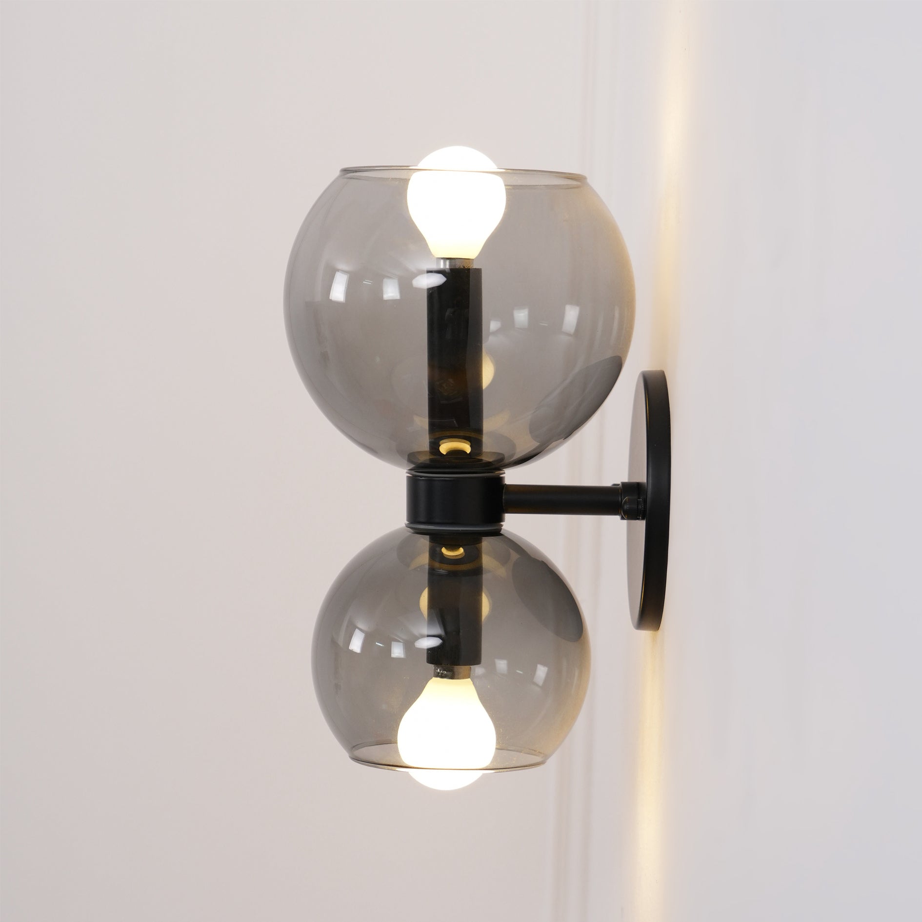 Side view of glass lighting fixture for scale and shape reference