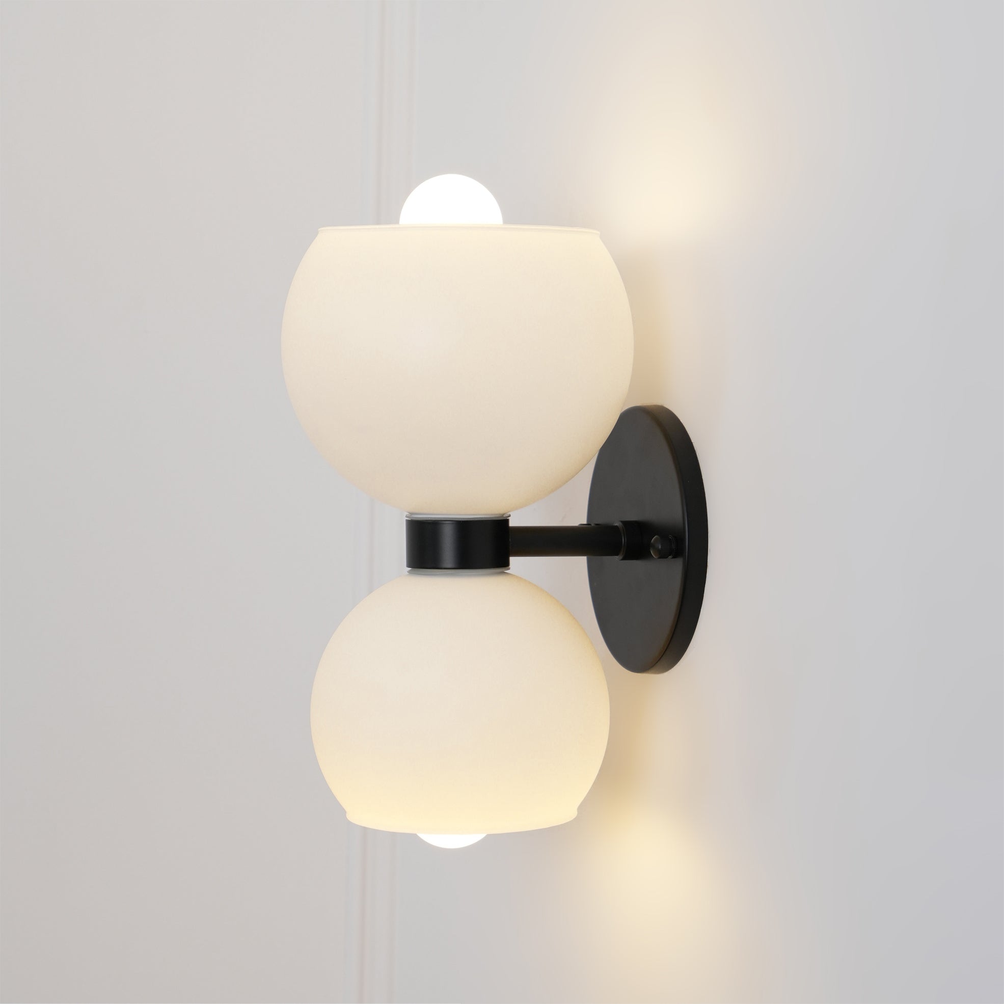 Close-up angle of Betty Wall Lamp showing form and material detail
