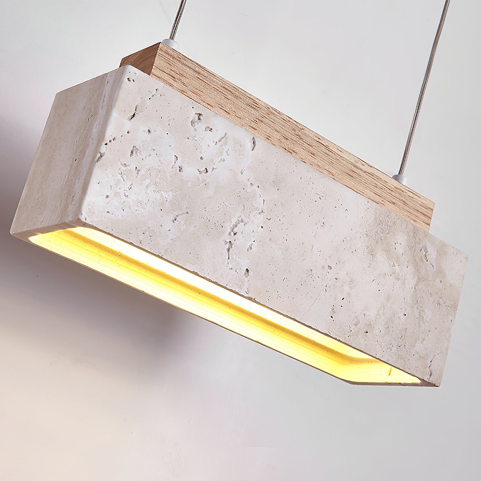 Side view of travertine pendant light for scale and shape reference