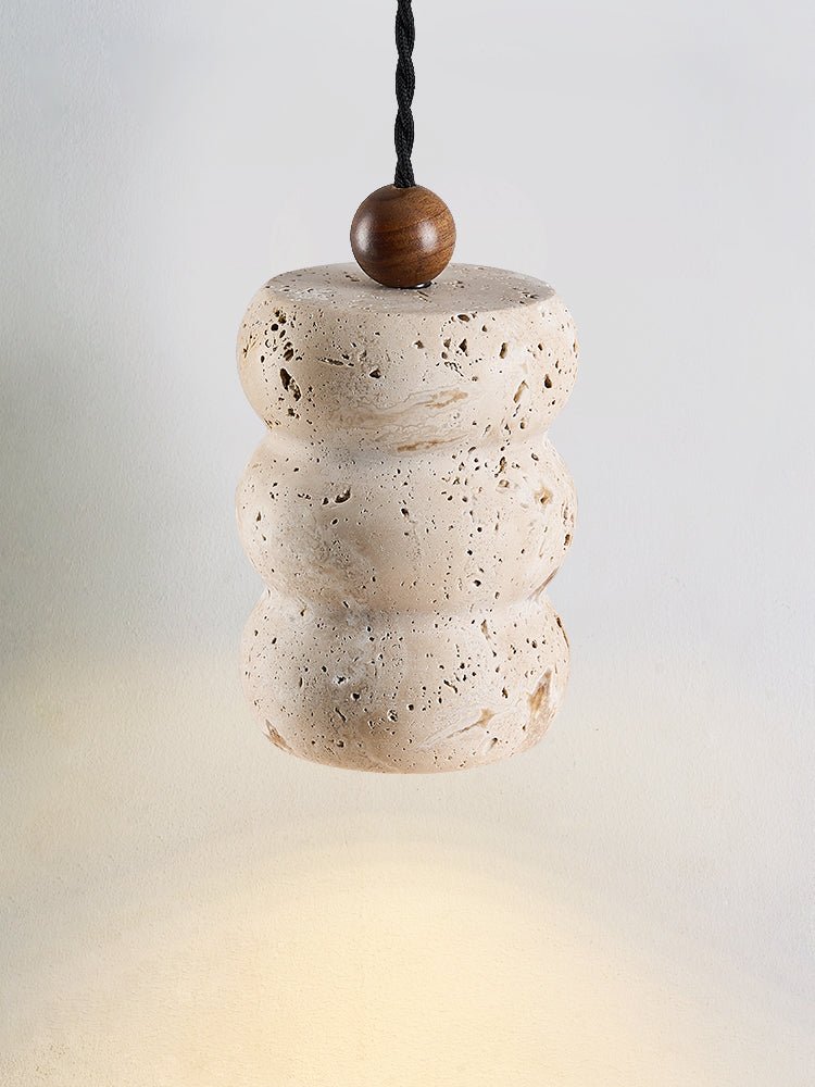 Side view of travertine pendant light for scale and shape reference