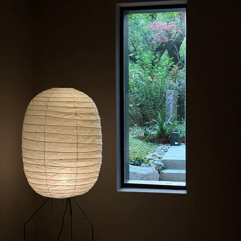 Side view of metal floor lamp for scale and shape reference