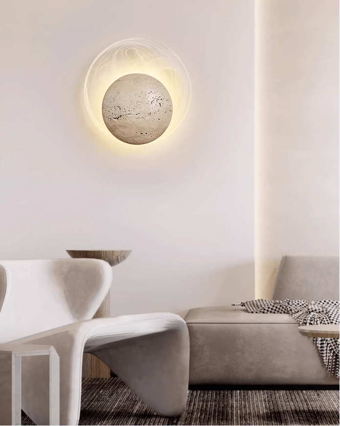 Close-up angle of Genesis Travertine Wall Lamp showing form and material detail