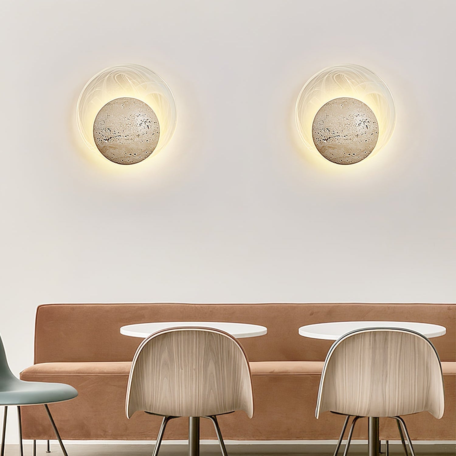 Close-up angle of Genesis Travertine Wall Lamp showing form and material detail