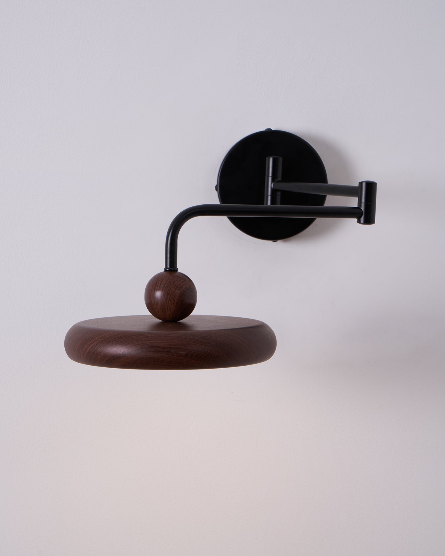 Side view of wood lighting fixture for scale and shape reference