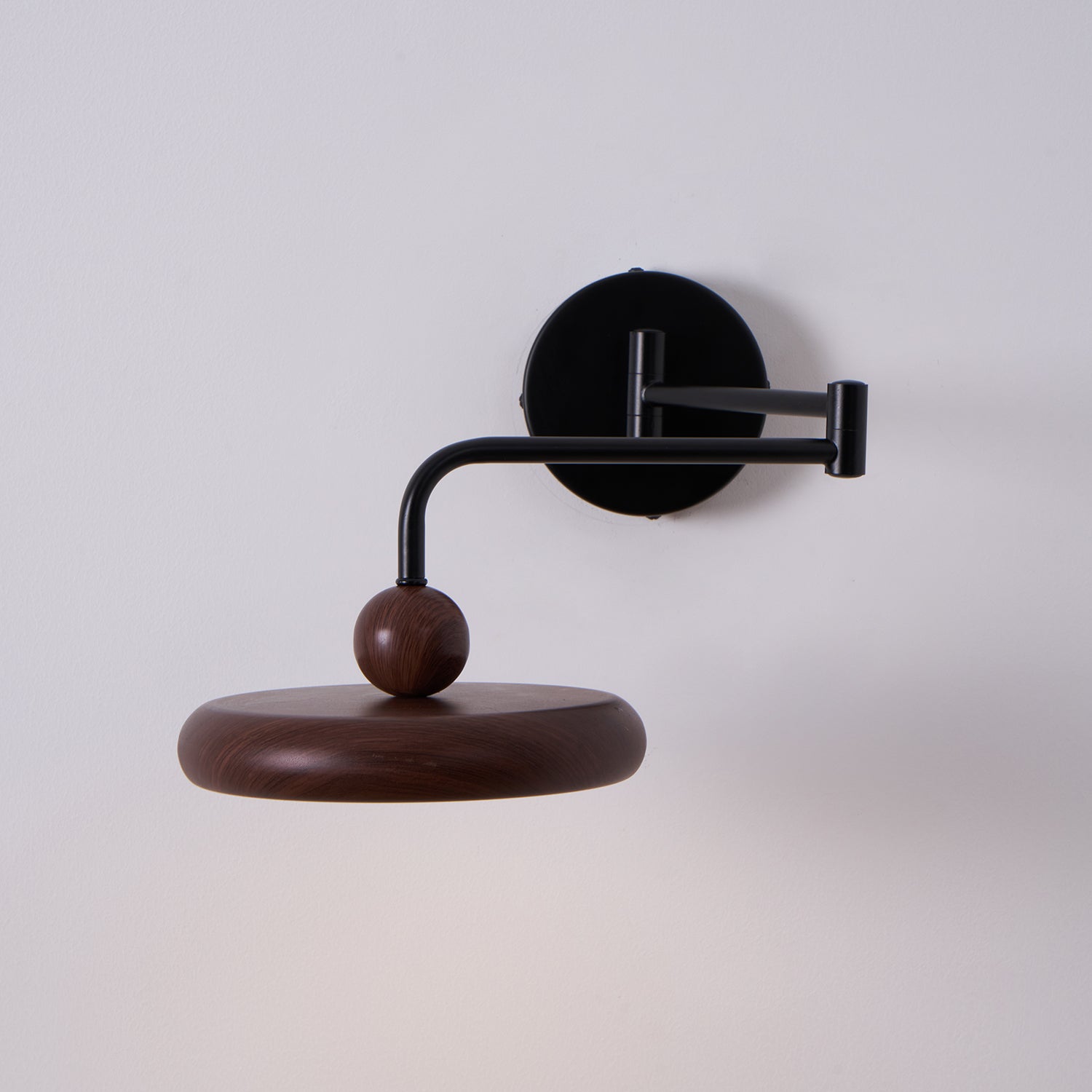 Side view of wood lighting fixture for scale and shape reference