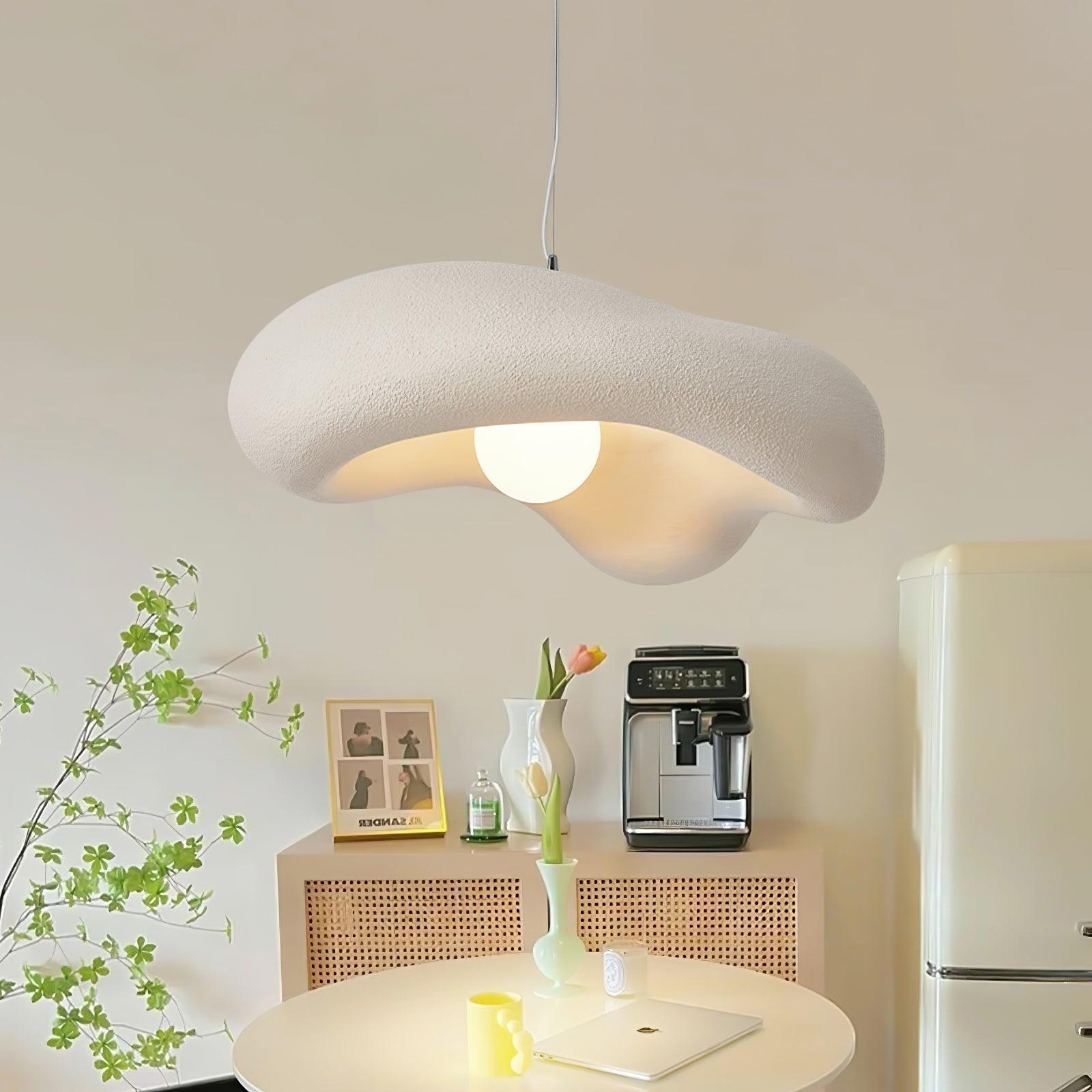 Side view of metal pendant light for scale and shape reference