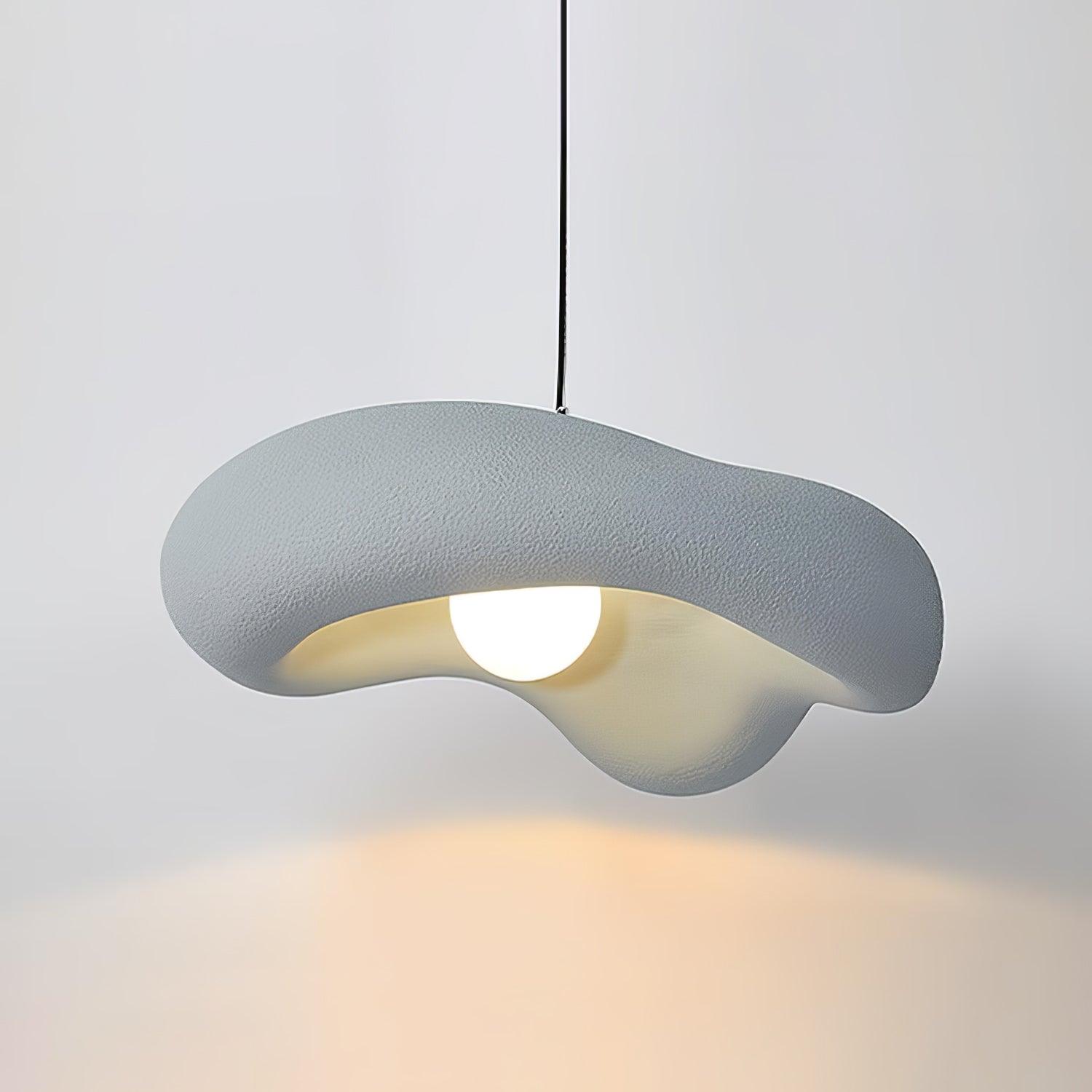Side view of metal pendant light for scale and shape reference