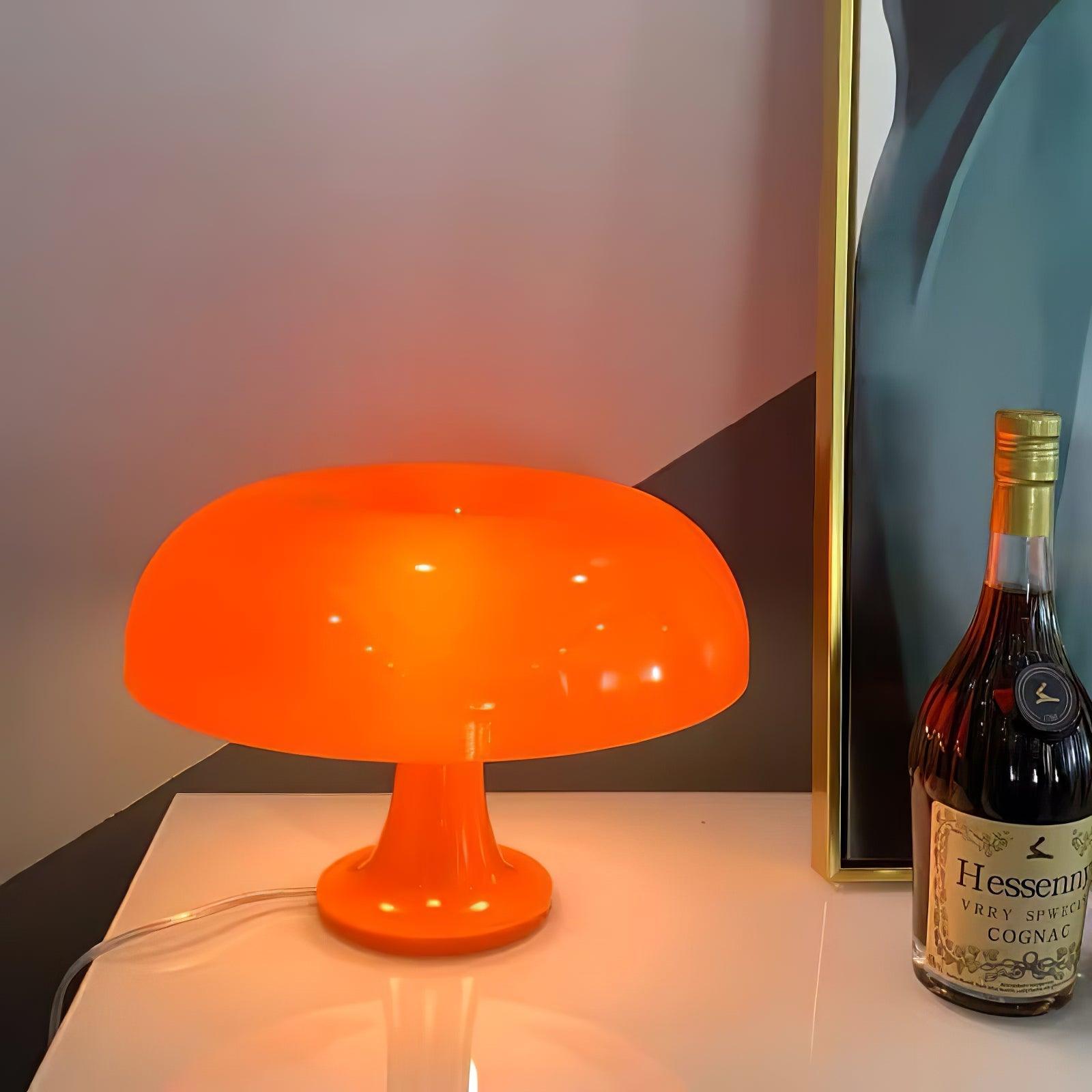 Side view of metal table lamp for scale and shape reference