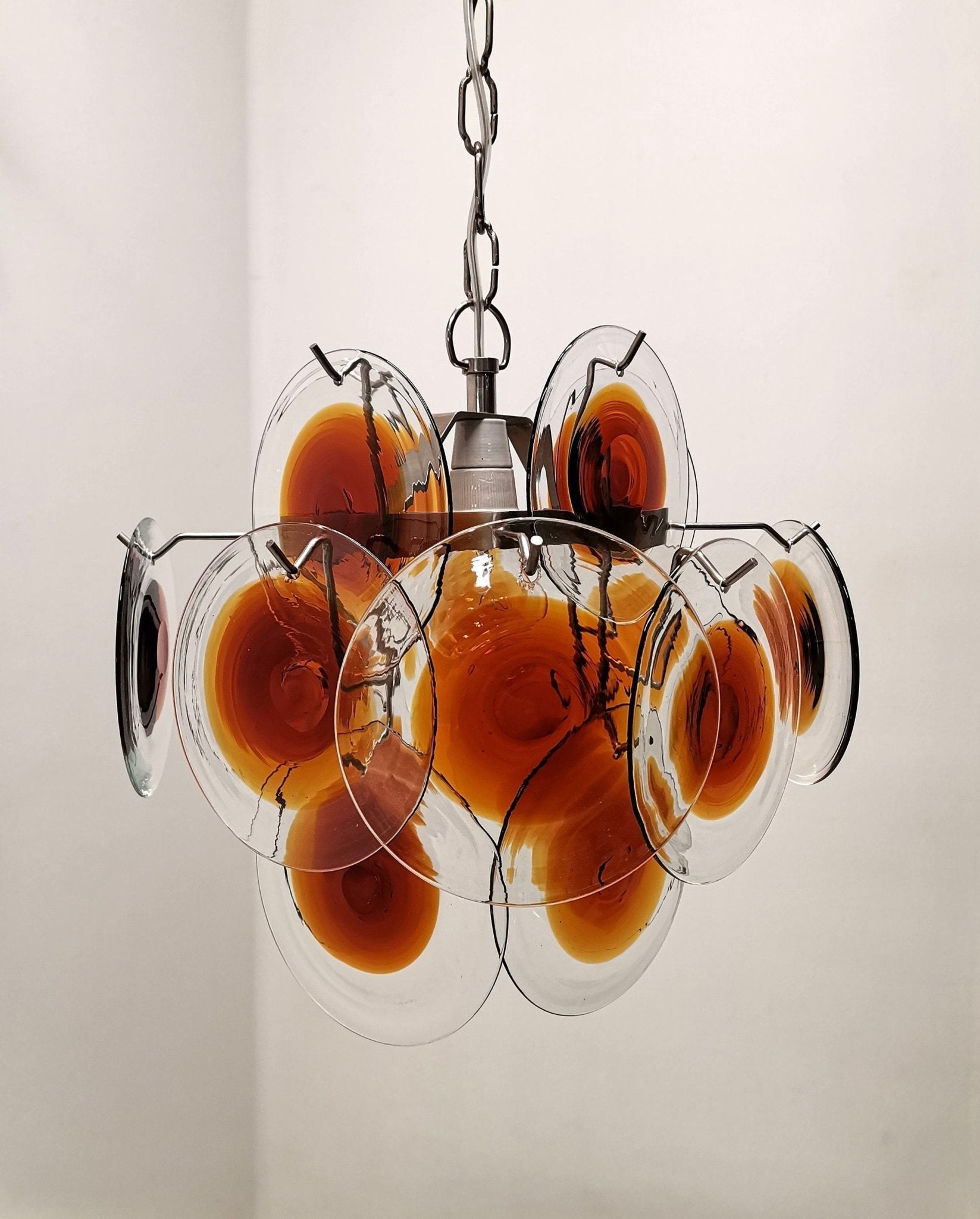 Side view of glass chandelier for scale and shape reference