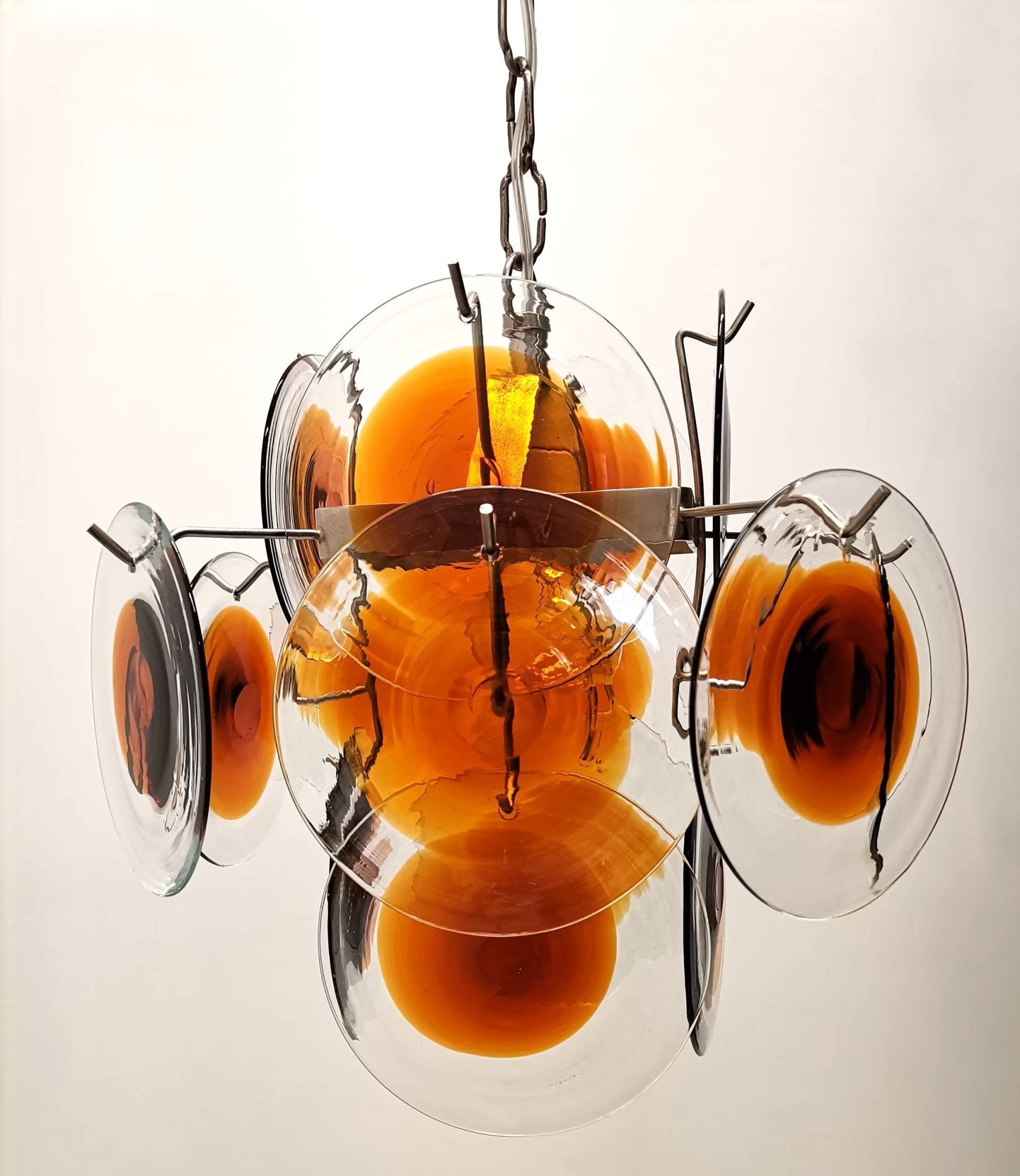 Side view of glass chandelier for scale and shape reference