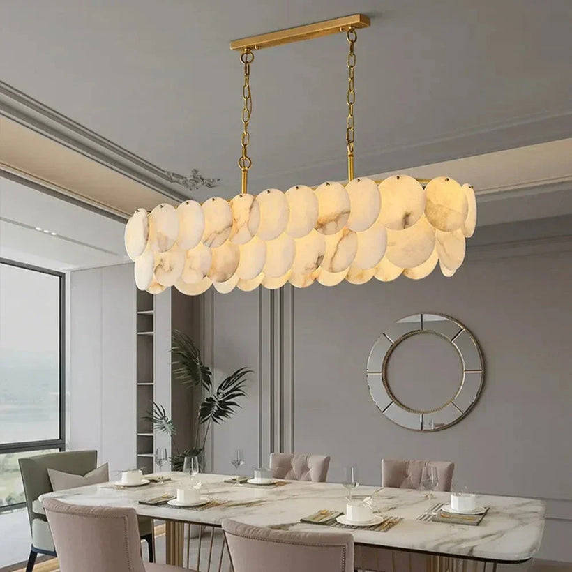 Linear alabaster chandelier shown at dining-room scale